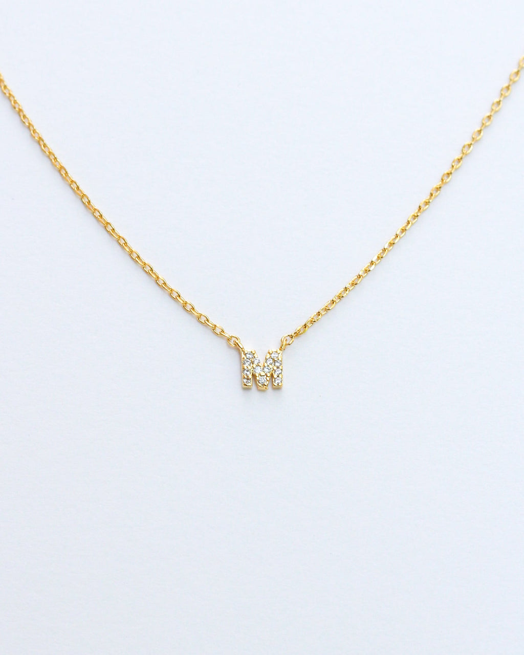 KADOU BOUTIQUE Mini Pave Initial Necklace — fabric or material detail