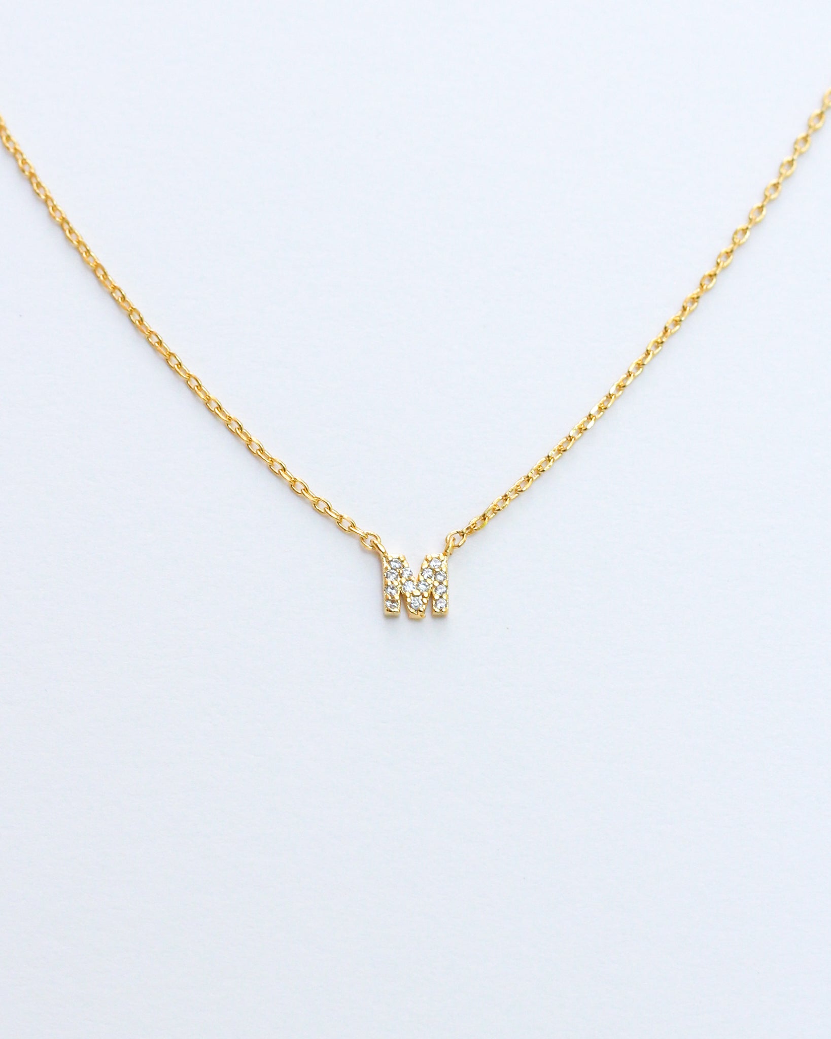 KADOU BOUTIQUE Mini Pave Initial Necklace — fabric or material detail