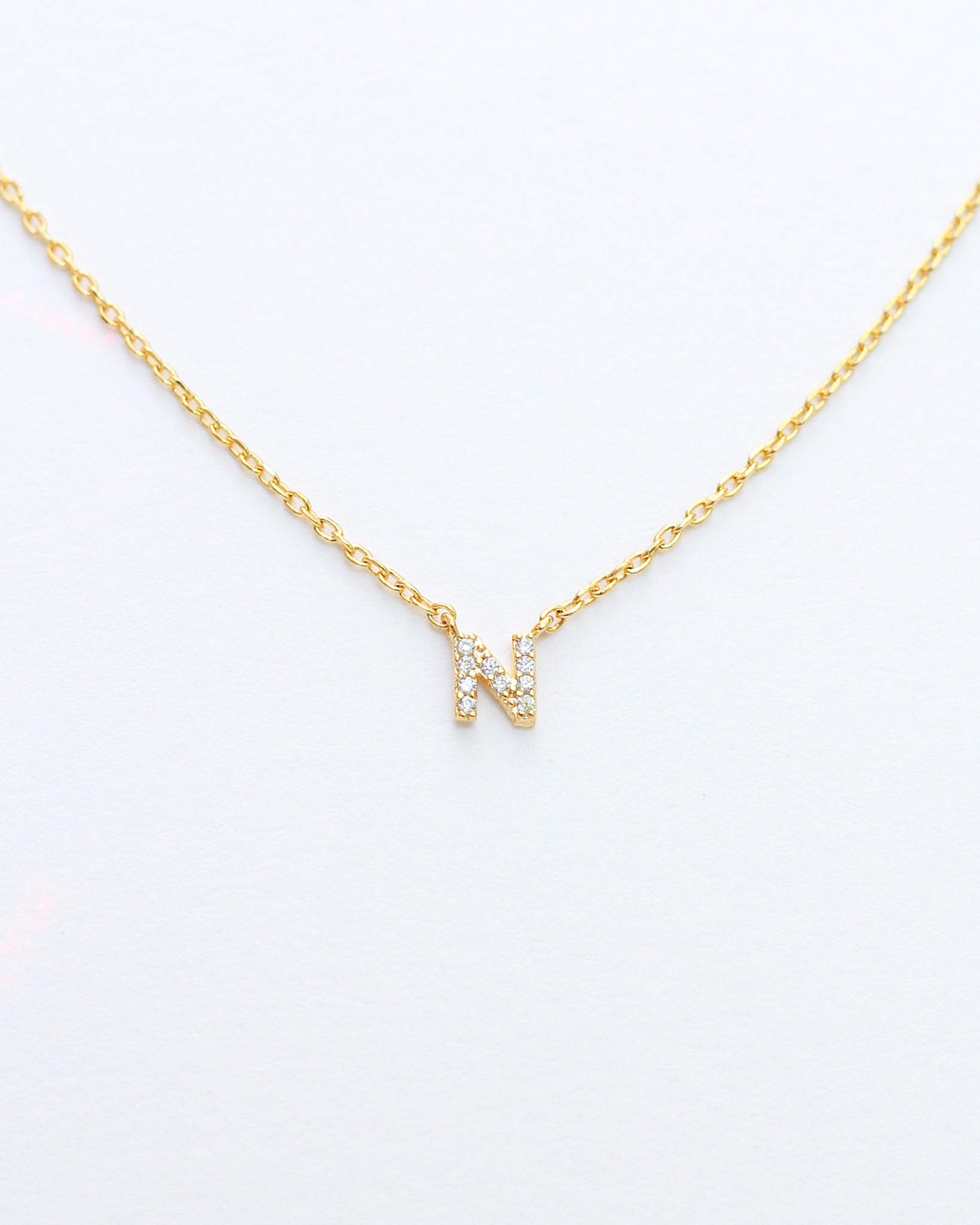 KADOU BOUTIQUE Mini Pave Initial Necklace — feature highlight