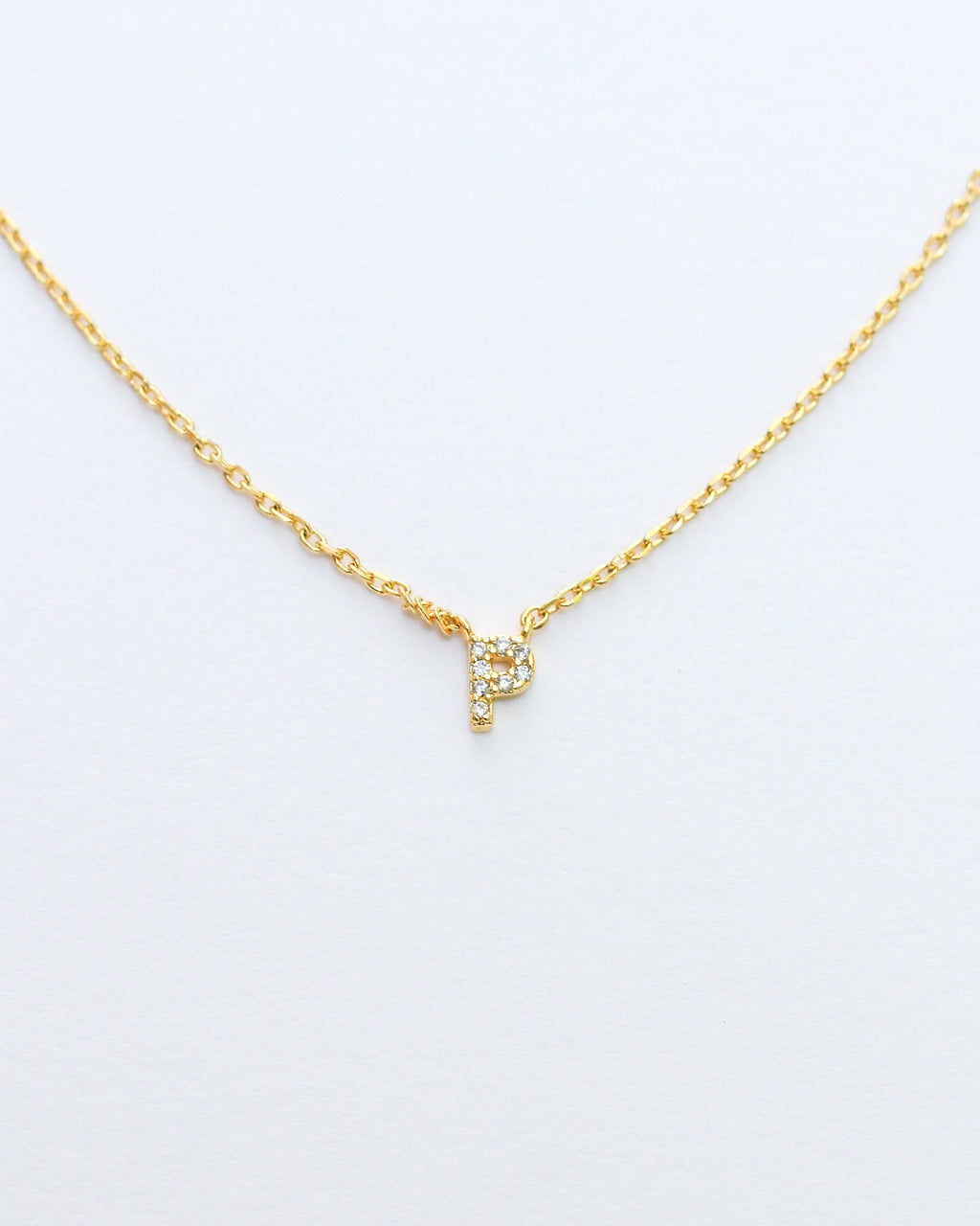 KADOU BOUTIQUE Mini Pave Initial Necklace — product on model
