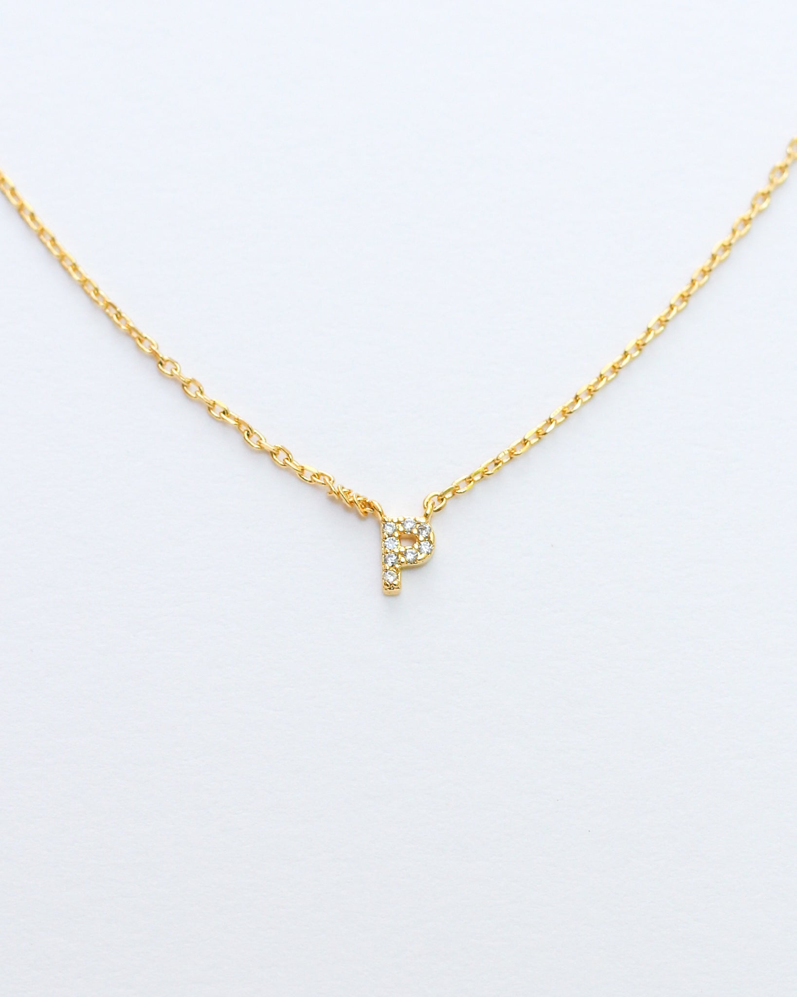 KADOU BOUTIQUE Mini Pave Initial Necklace — product on model