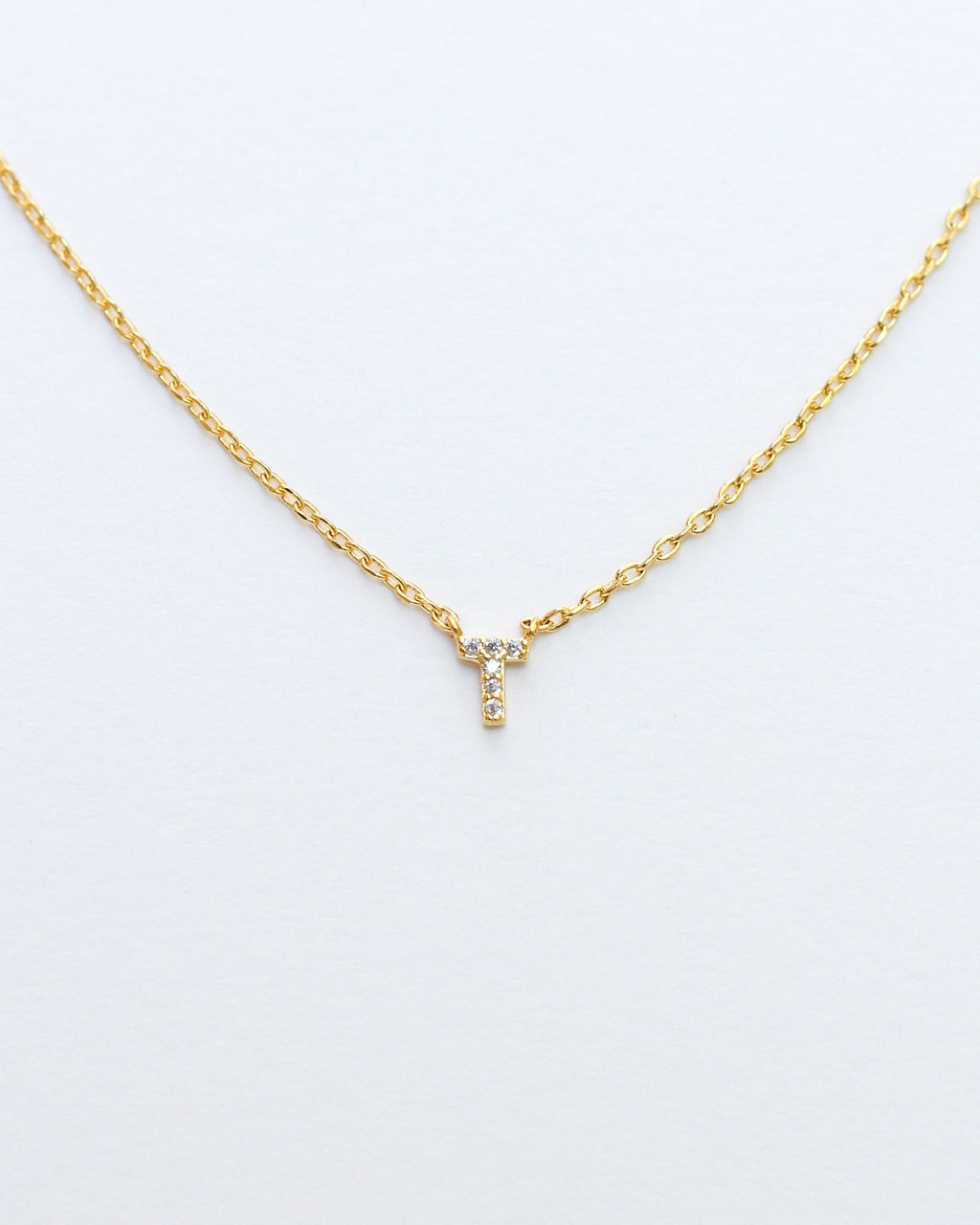 KADOU BOUTIQUE Mini Pave Initial Necklace — detail close-up
