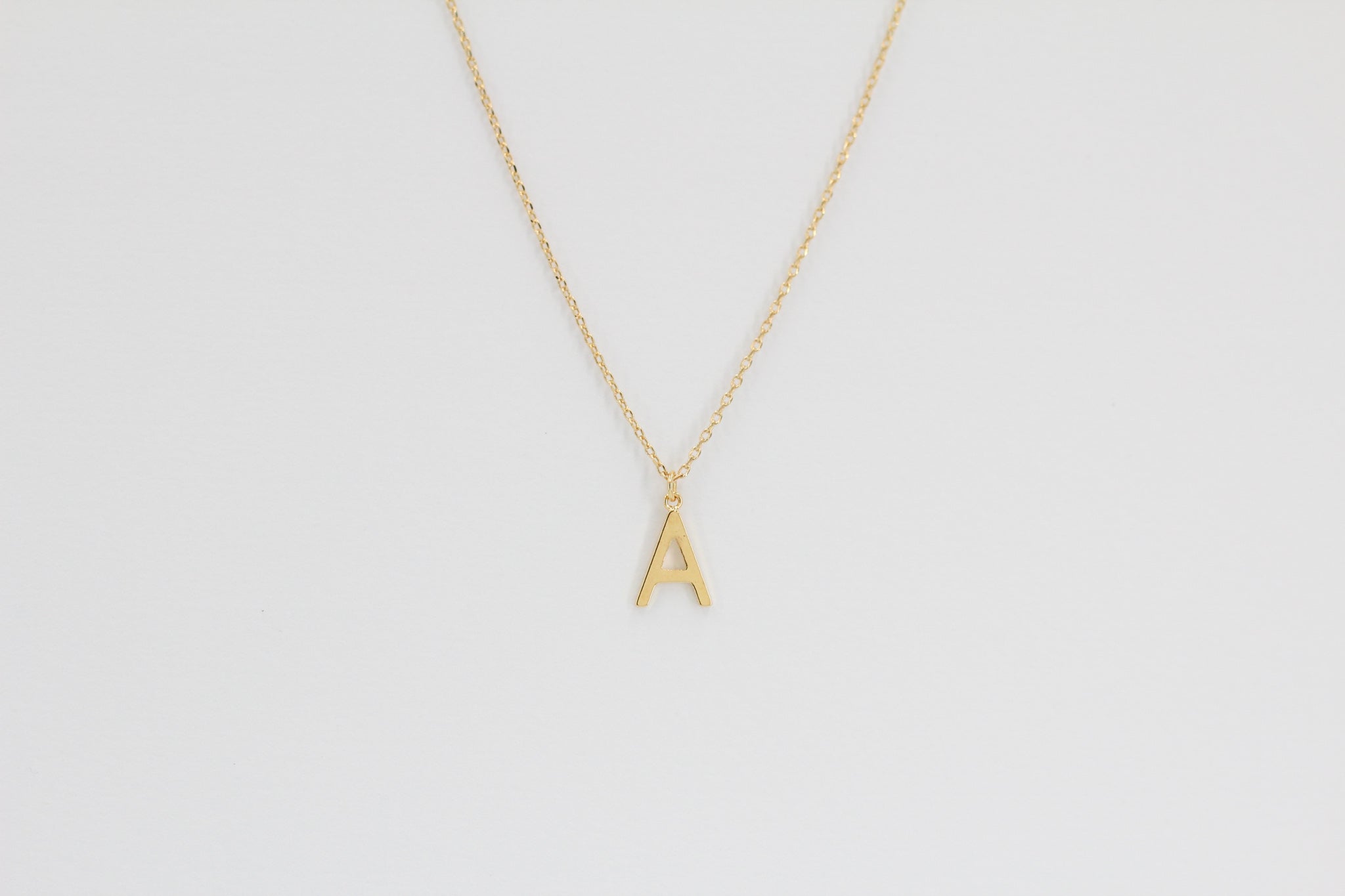 KADOU BOUTIQUE Letter Pendent Necklace — main product shot