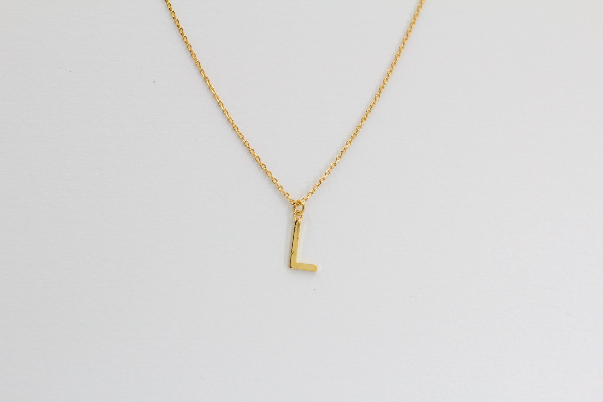 KADOU BOUTIQUE Letter Pendent Necklace — comparison shot