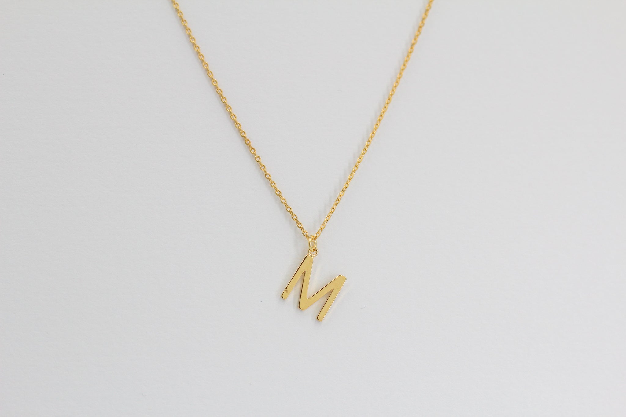 KADOU BOUTIQUE Letter Pendent Necklace — packaging