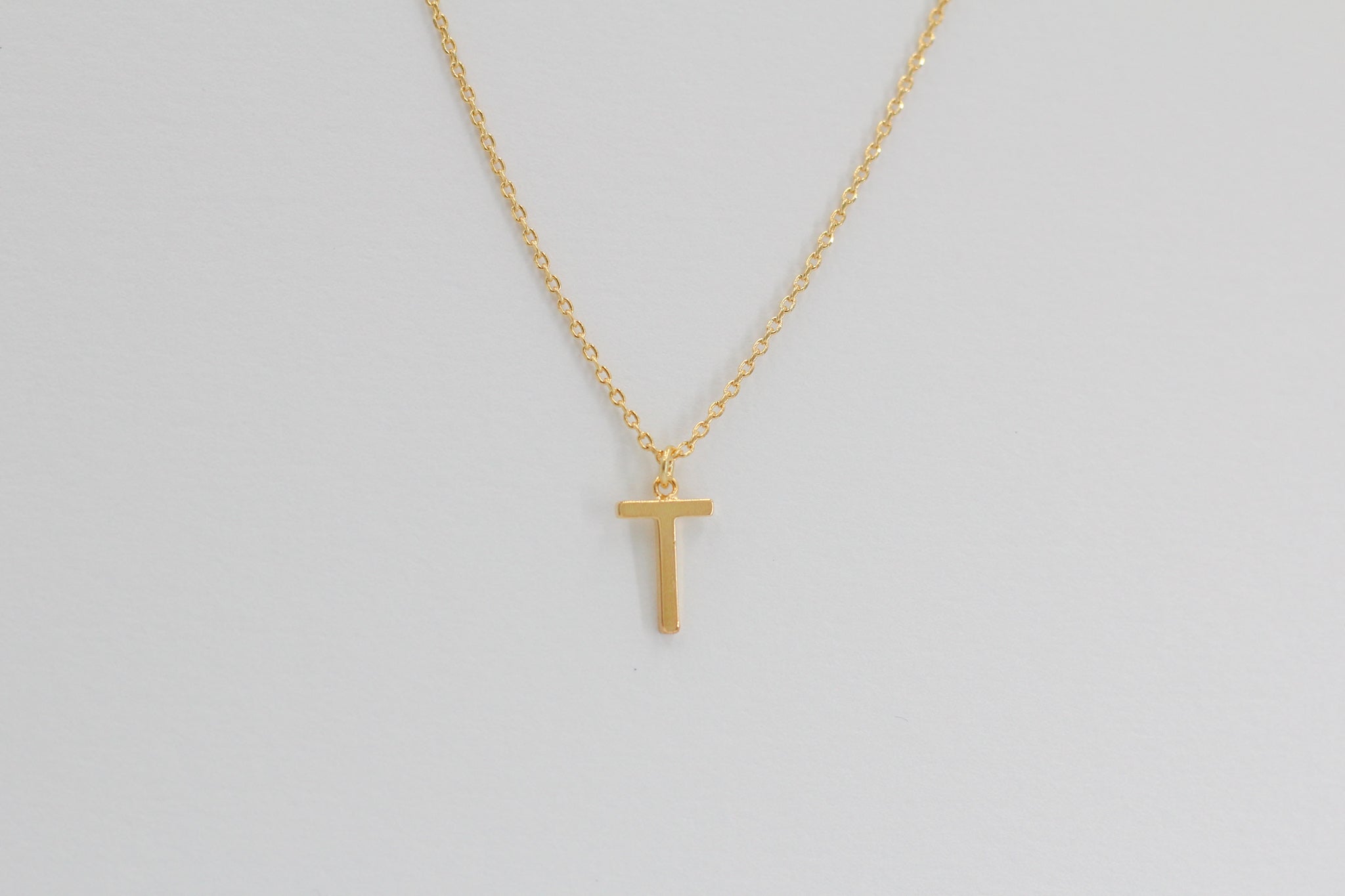 KADOU BOUTIQUE Letter Pendent Necklace — lifestyle context