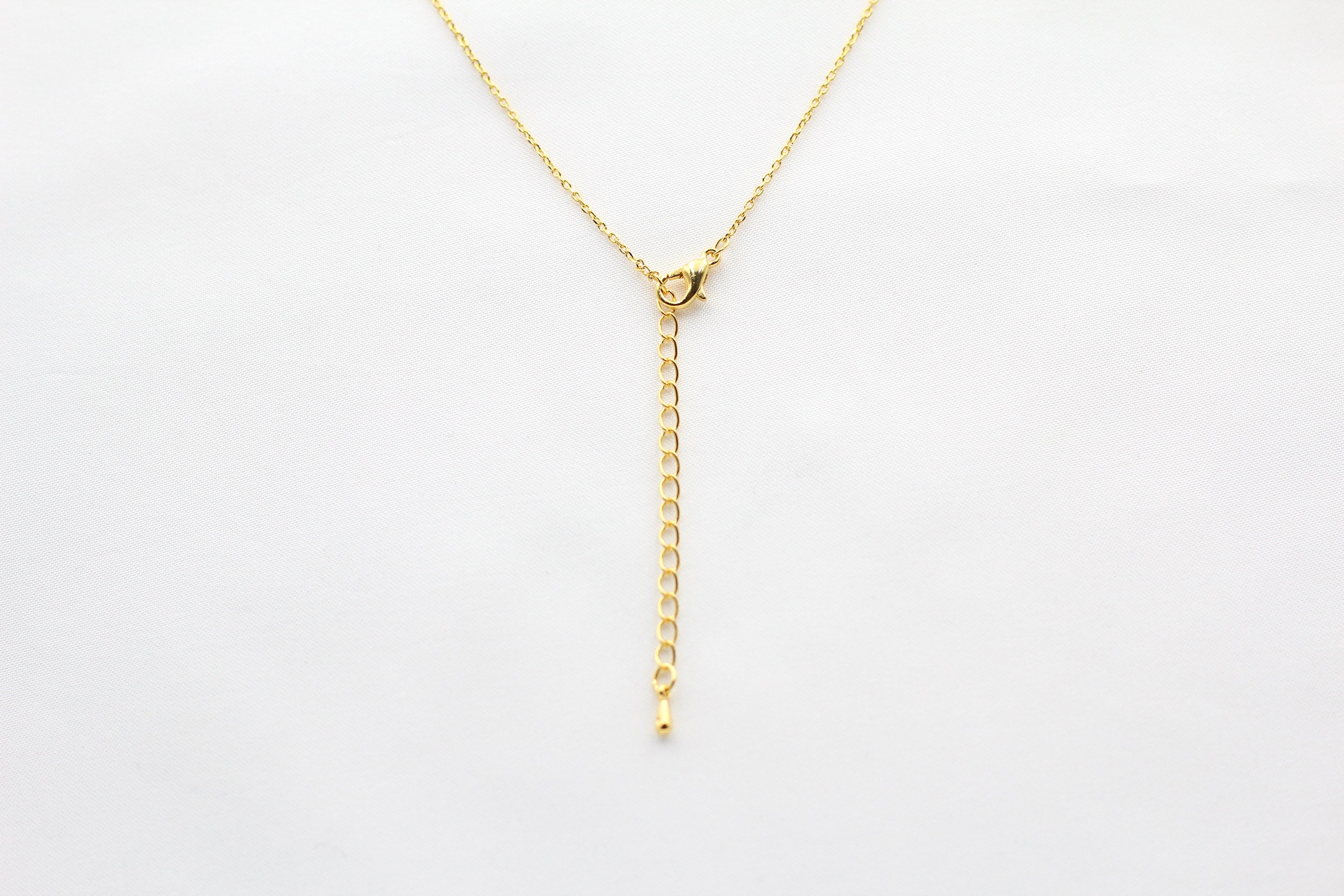 KADOU BOUTIQUE Shiny Lock and Key Ring Necklace — detail close-up