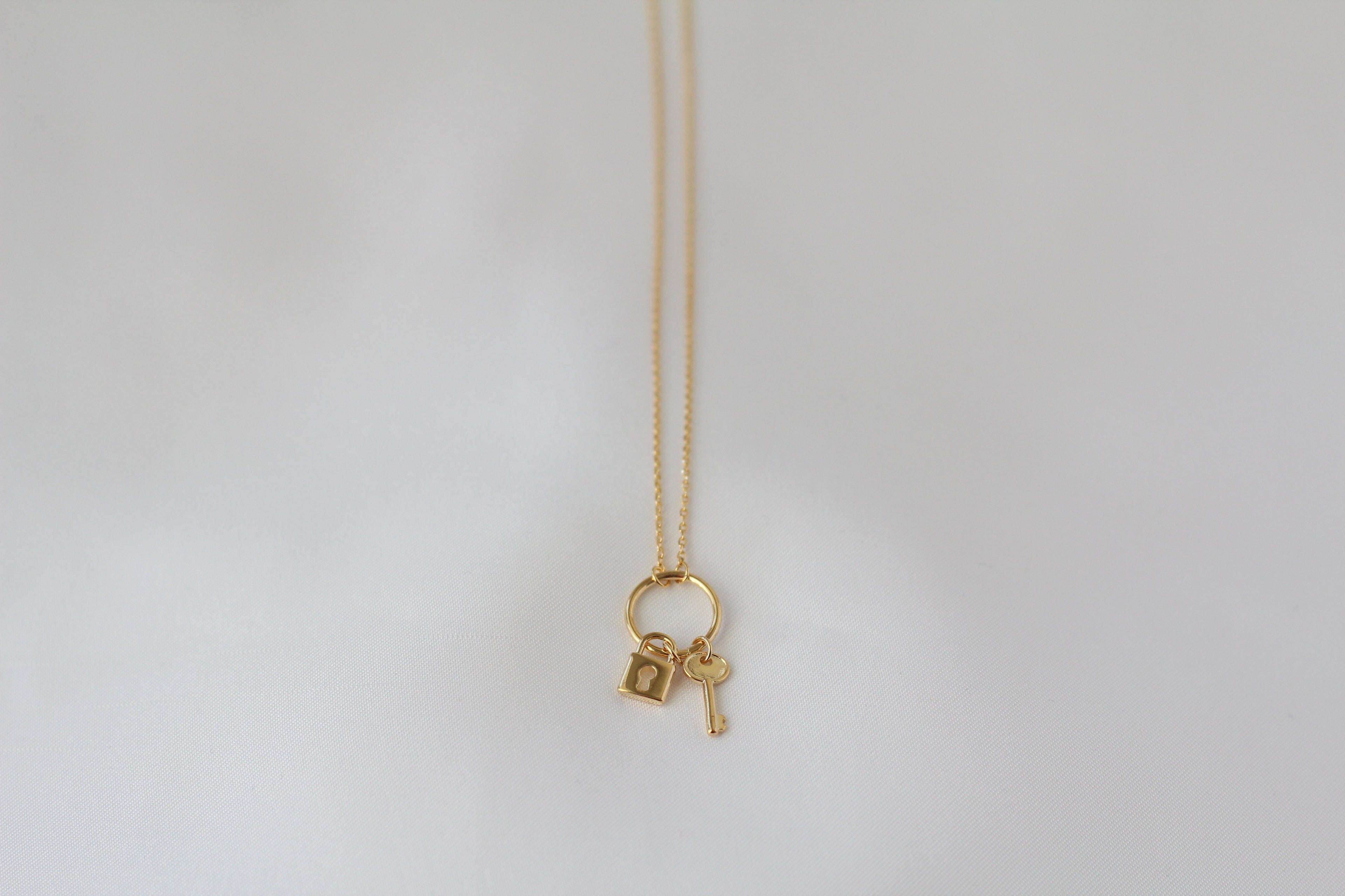 KADOU BOUTIQUE Shiny Lock and Key Ring Necklace — lifestyle context