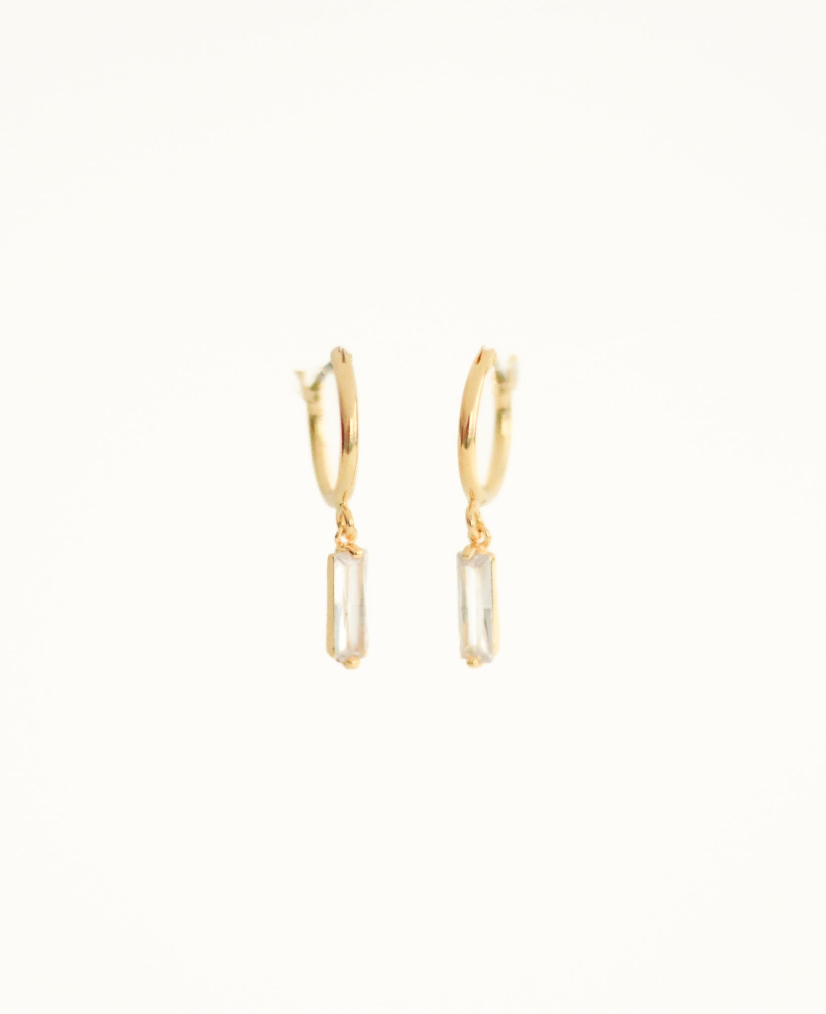 KADOU BOUTIQUE Baguette Dangle Huggie Earrings — detail close-up