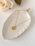 KADOU BOUTIQUE Twelve Star Disc Necklace — main product shot