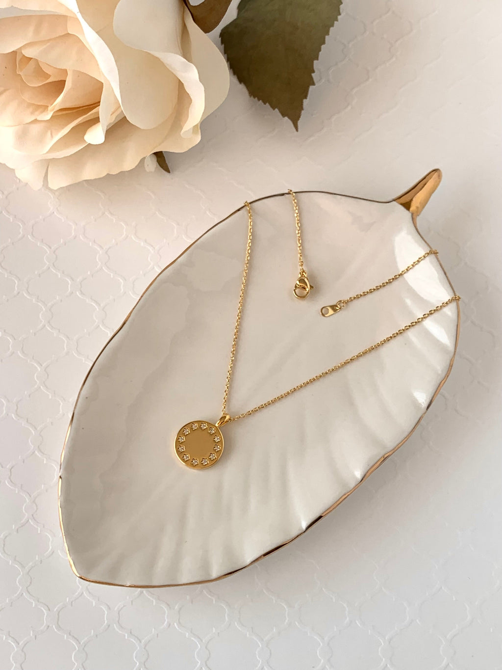 KADOU BOUTIQUE Twelve Star Disc Necklace — detail close-up