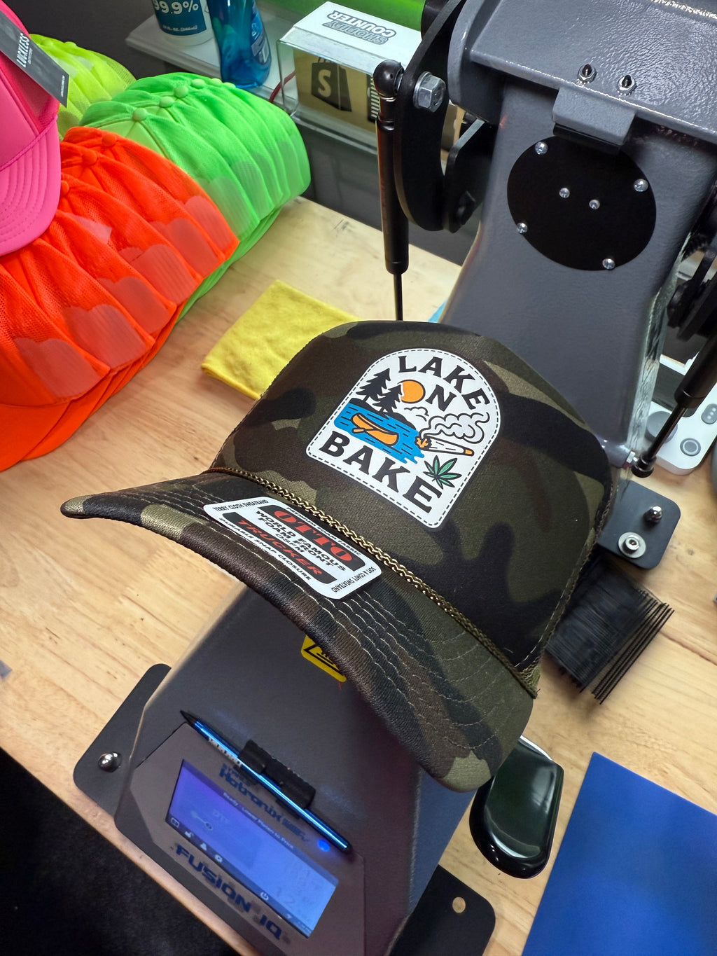 Luckless Outfitters Lake N Bake Trucker Hat — lifestyle context