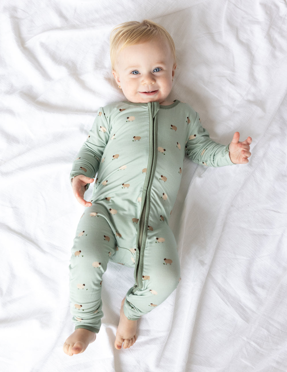 Elevated Faith Lamb Bamboo Convertible Footed Onesie — lifestyle context