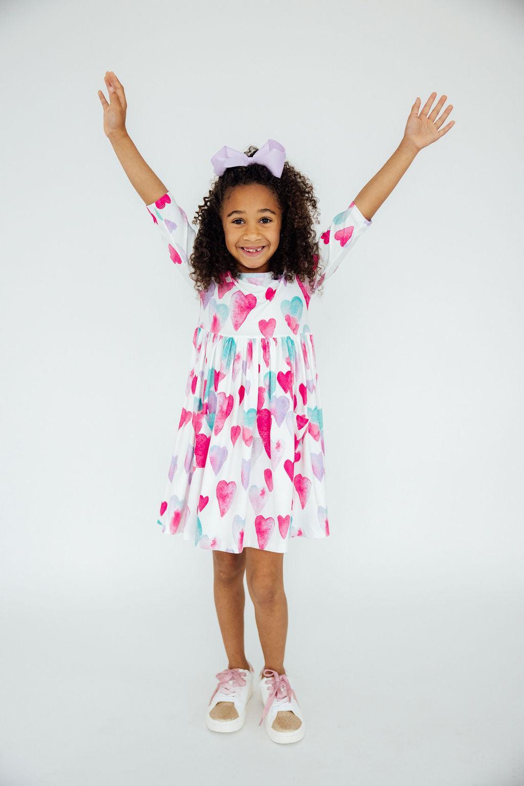 Mila & Rose ® Light Hearted 3/4 Sleeve Pocket Twirl Dress — side view