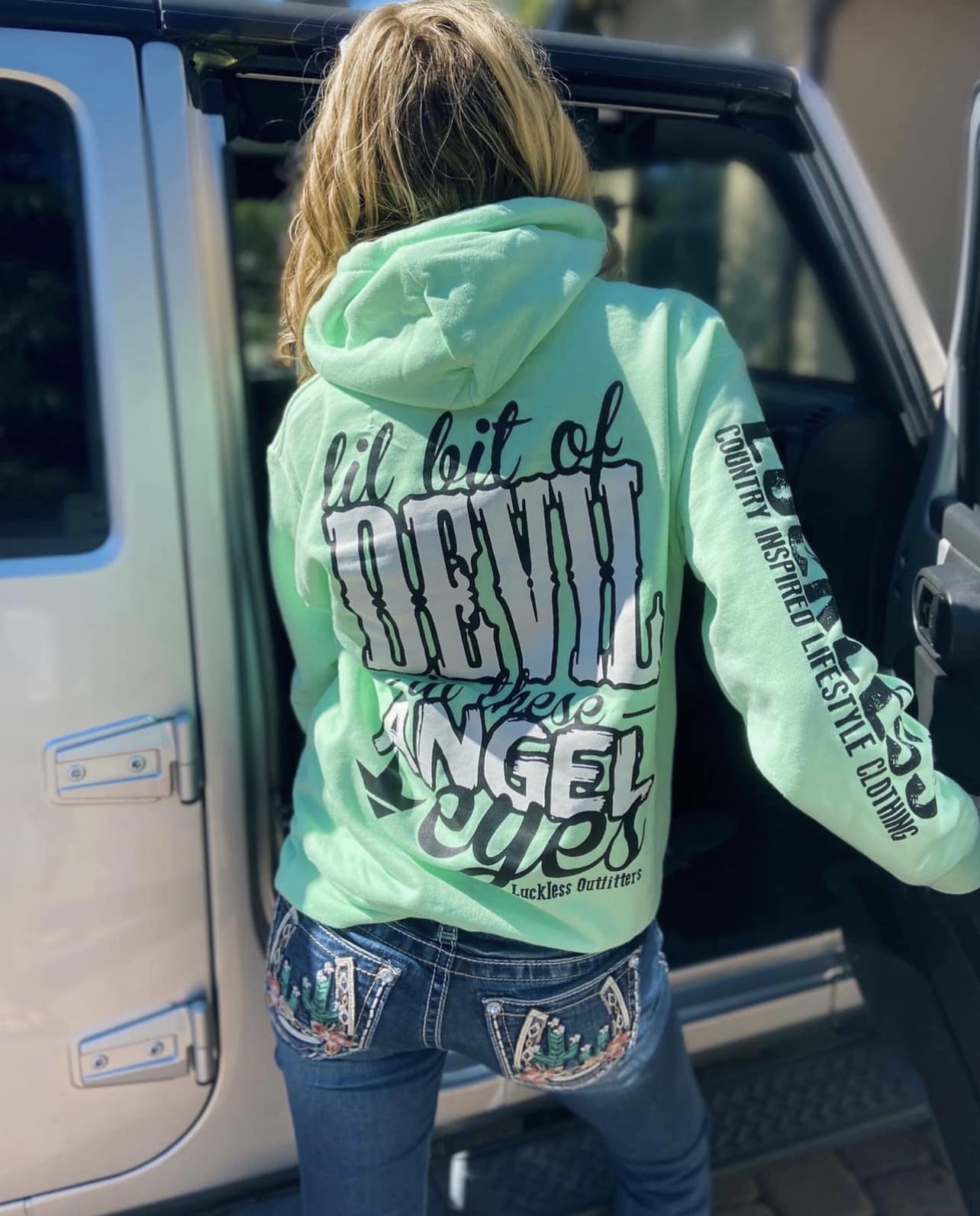 Luckless Outfitters Lil Bit Of Devil in these Angel Eyes Hoodie — back view