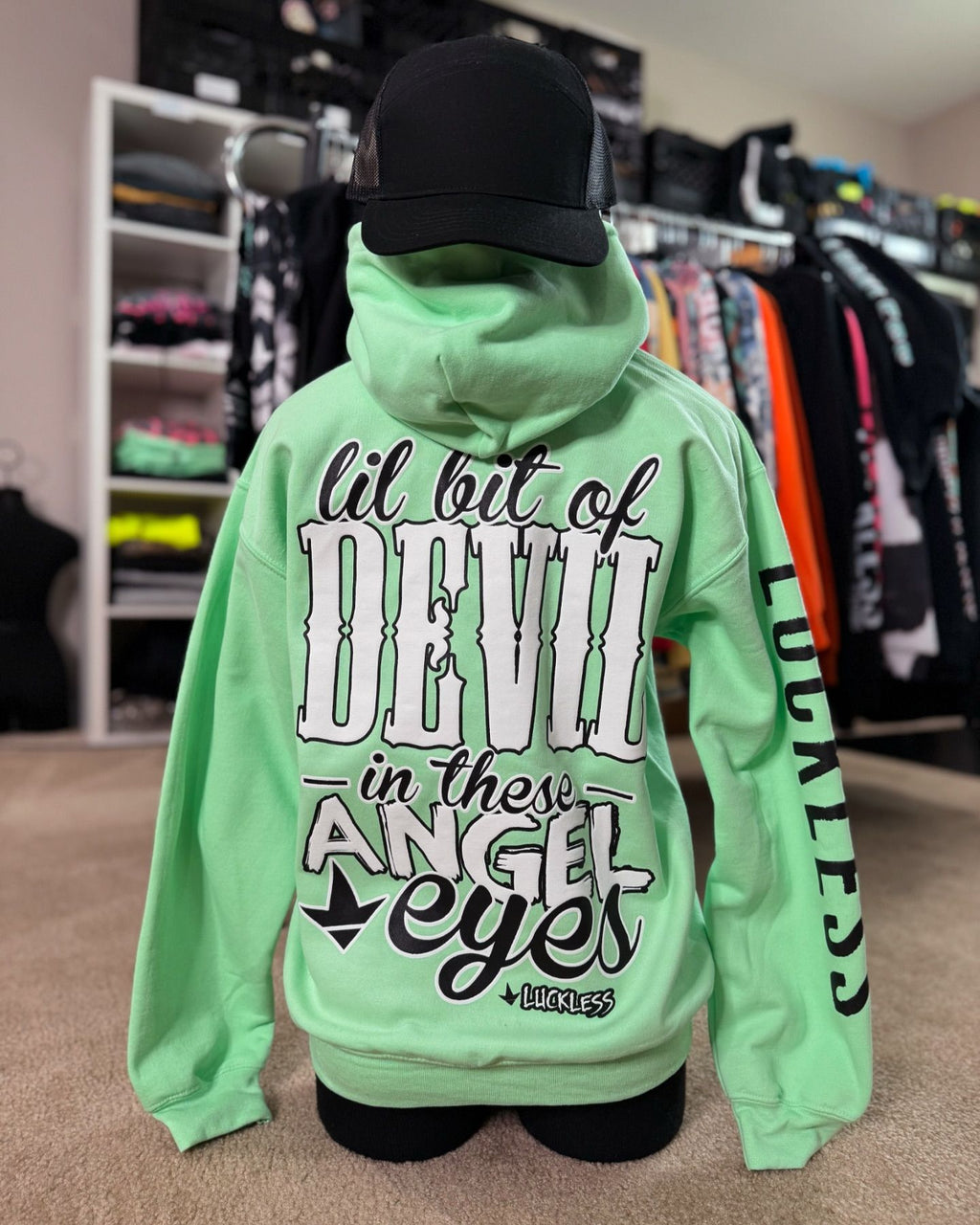 Luckless Outfitters Lil Bit Of Devil in these Angel Eyes Hoodie — in-use photo
