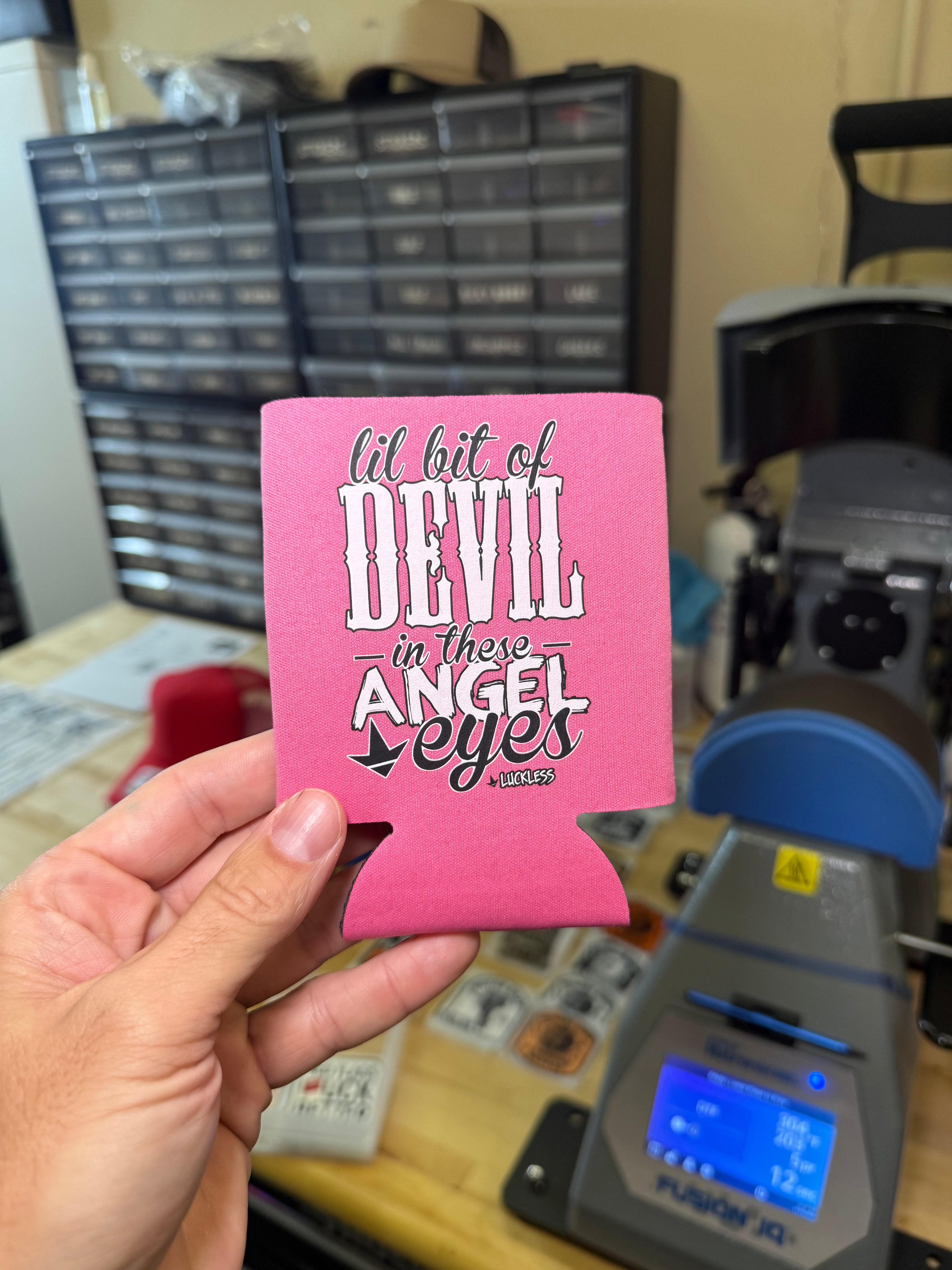 Luckless Outfitters Lil Bit Of Devil in these Angel Eyes Koozie — alternative angle