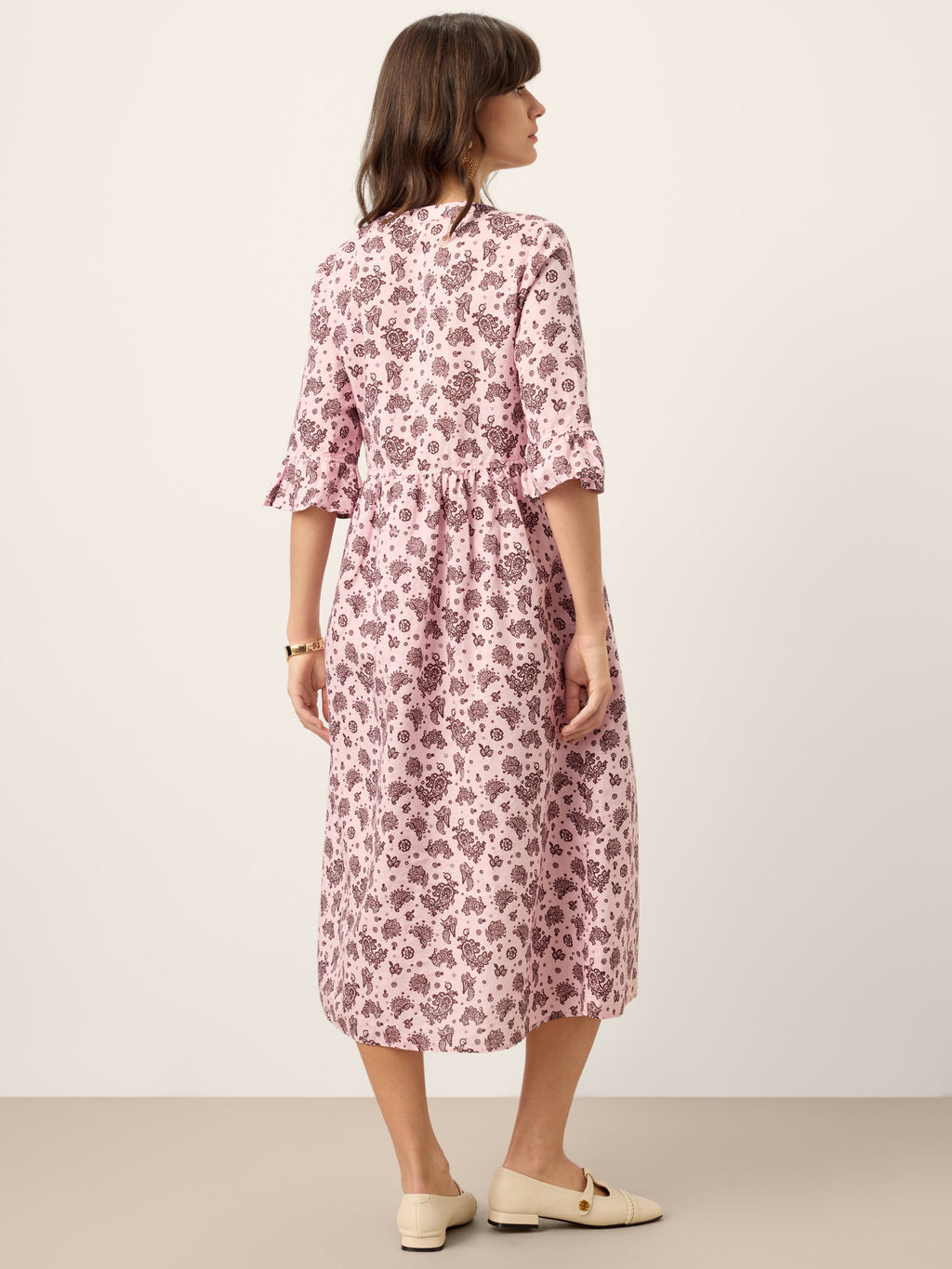 LINTICO Linen Paisley Pintucked Ruffle-Cuff Maxi Dress MAELYN — LINTICO branding close-up