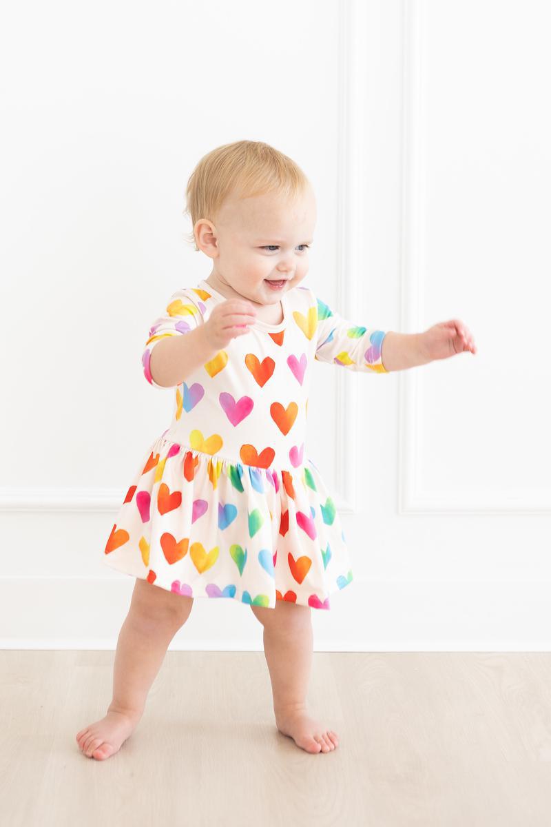 Mila & Rose ® Lotta Love 3/4 Sleeve Twirl Bodysuit — detail close-up