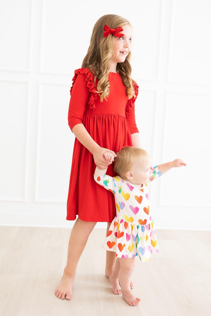Mila & Rose ® Lotta Love 3/4 Sleeve Twirl Bodysuit — lifestyle context