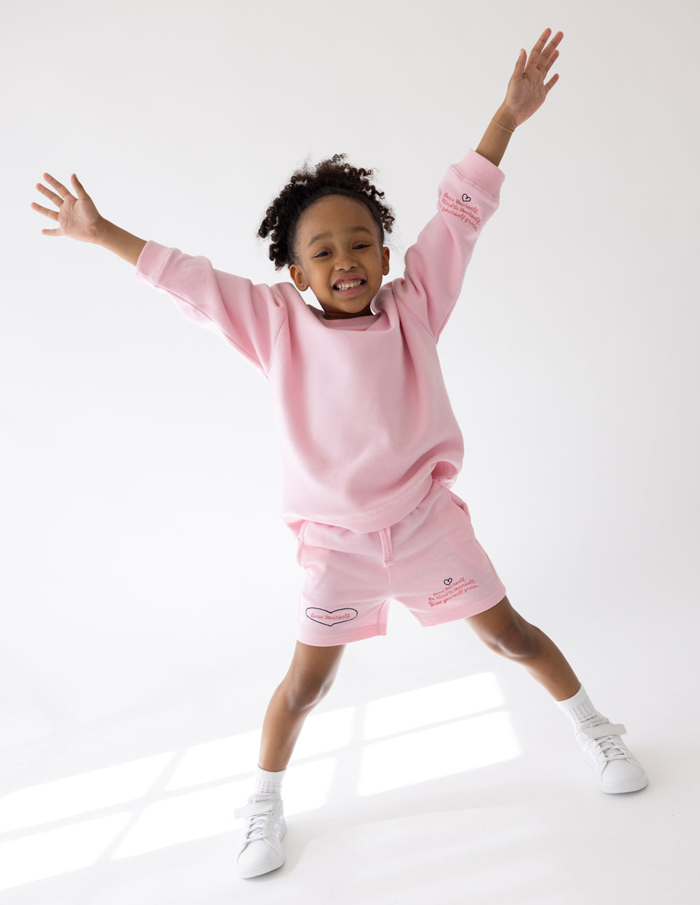 Elevated Faith Love Yourself Kids Short — detail close-up