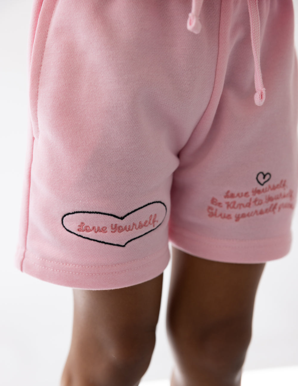 Elevated Faith Love Yourself Kids Short — side view