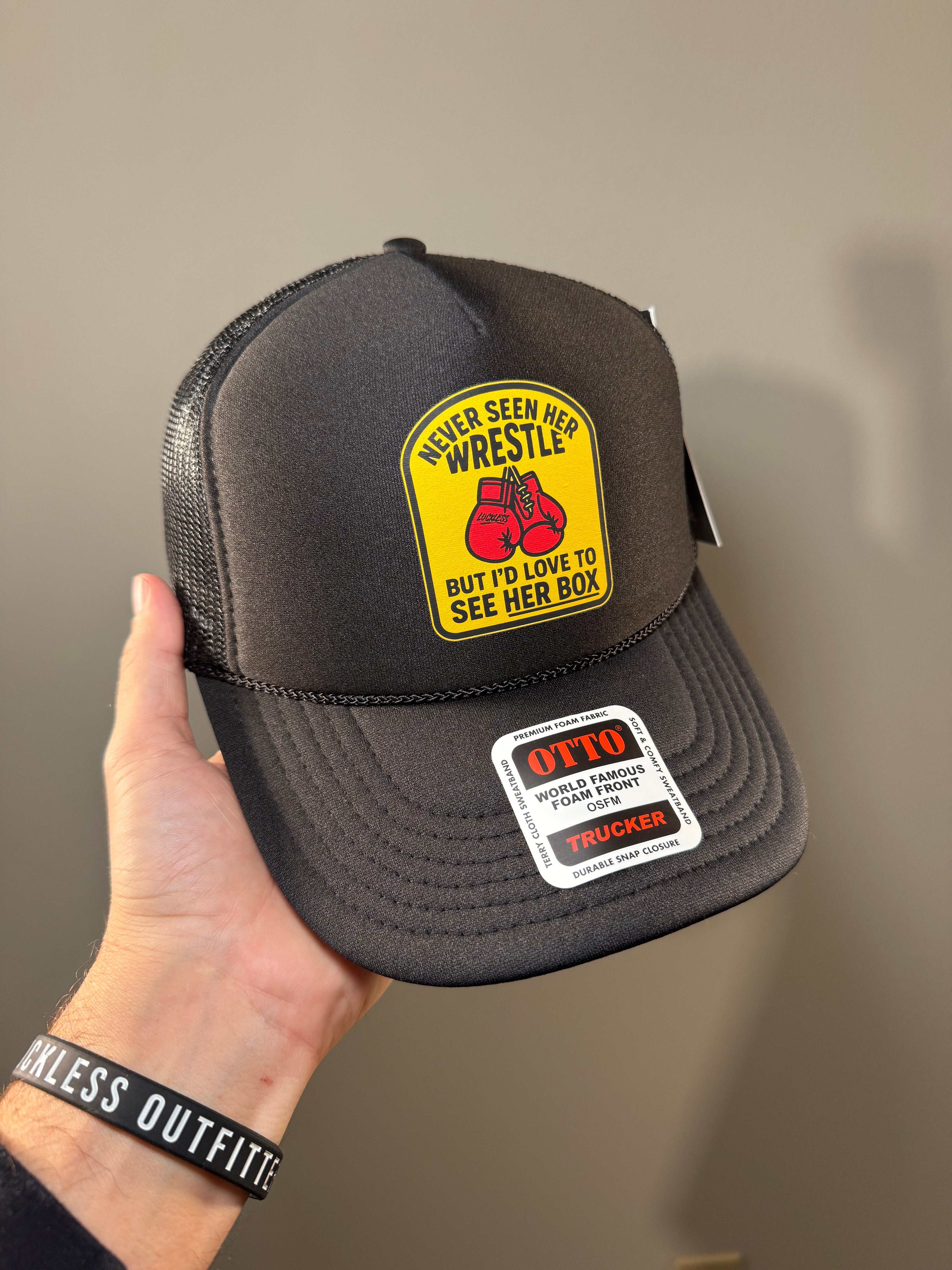 Luckless Outfitters Love to See Her Box Trucker Hat — lifestyle context