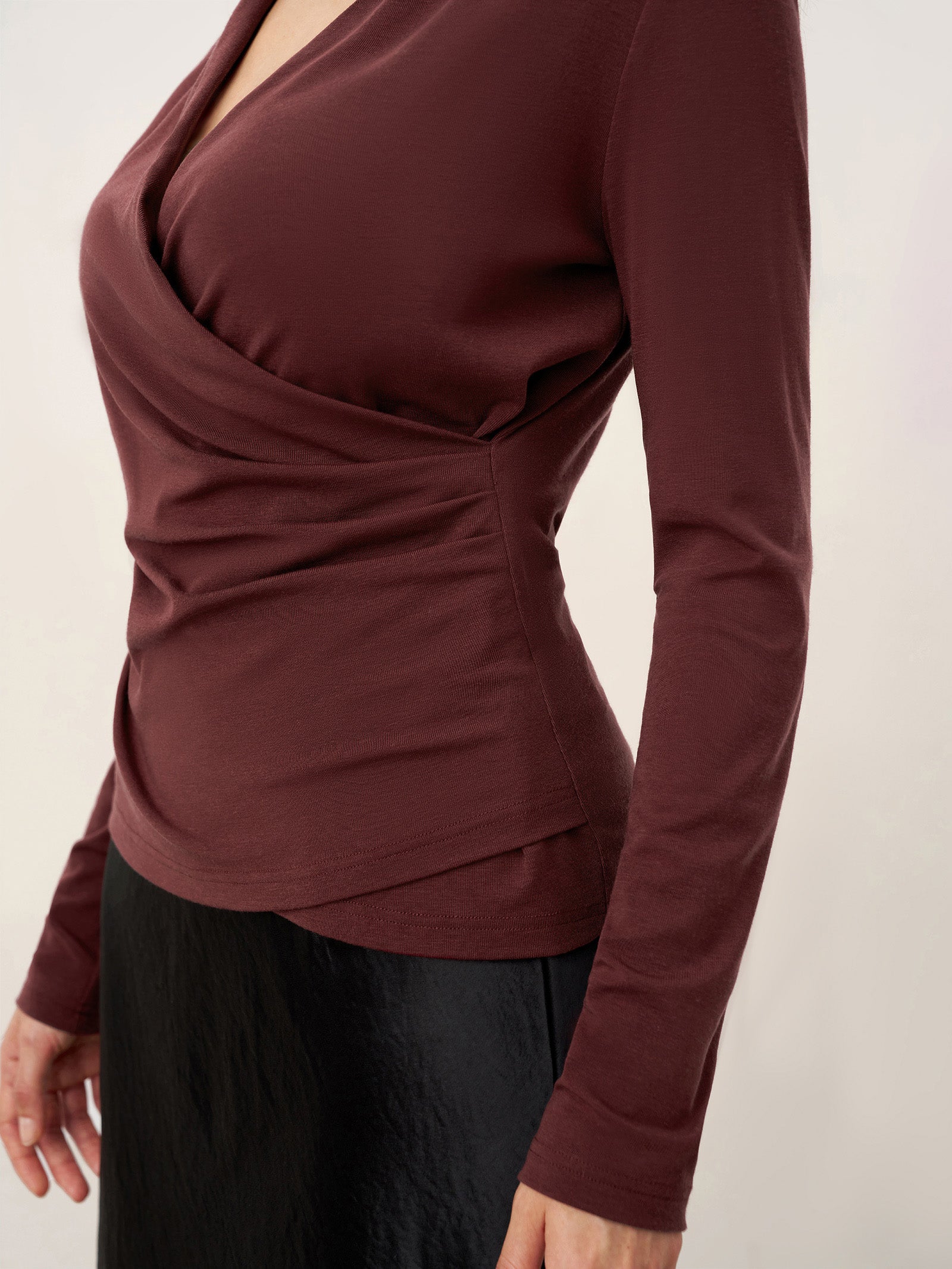 LINTICO Wool Lyocell Asymmetric Ruched Overlap V-Neck Top TILLY — product on model