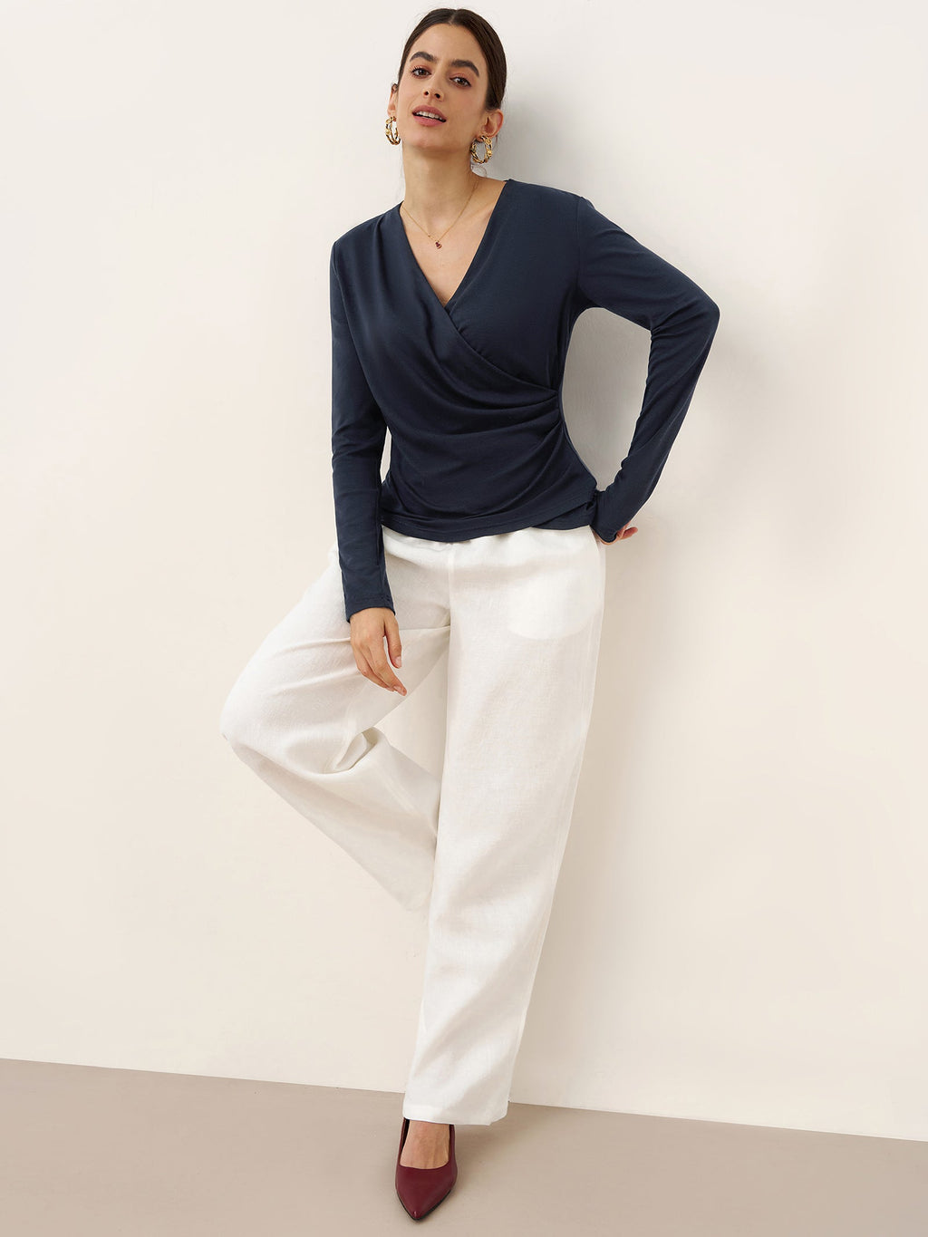 LINTICO Wool Lyocell Asymmetric Ruched Overlap V-Neck Top TILLY — lifestyle worn / used context