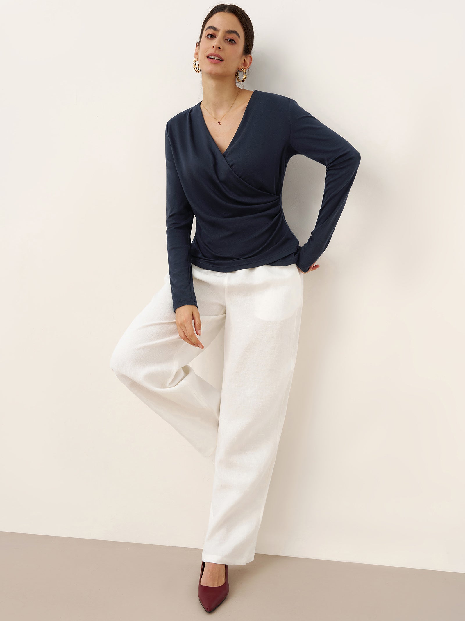 LINTICO Wool Lyocell Asymmetric Ruched Overlap V-Neck Top TILLY — lifestyle worn / used context