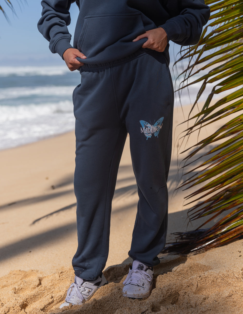 Elevated Faith Made New Butterfly Unisex Sweatpant — Elevated Faith branding close-up