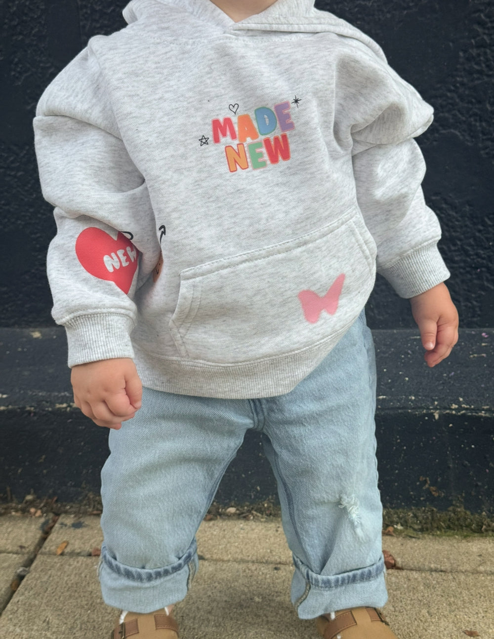 Elevated Faith Made New Kids Hoodie — fabric or material detail