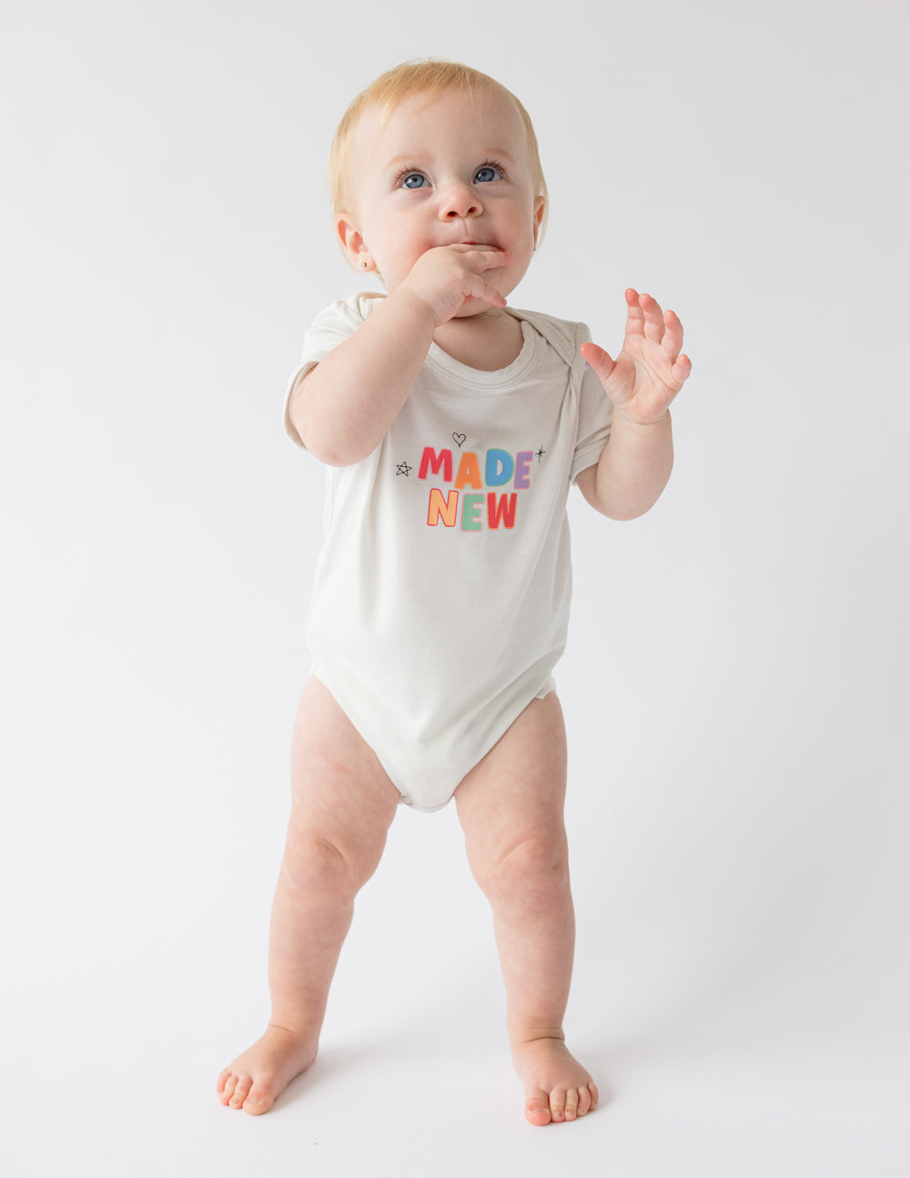 Elevated Faith Made New Onesie — main product shot