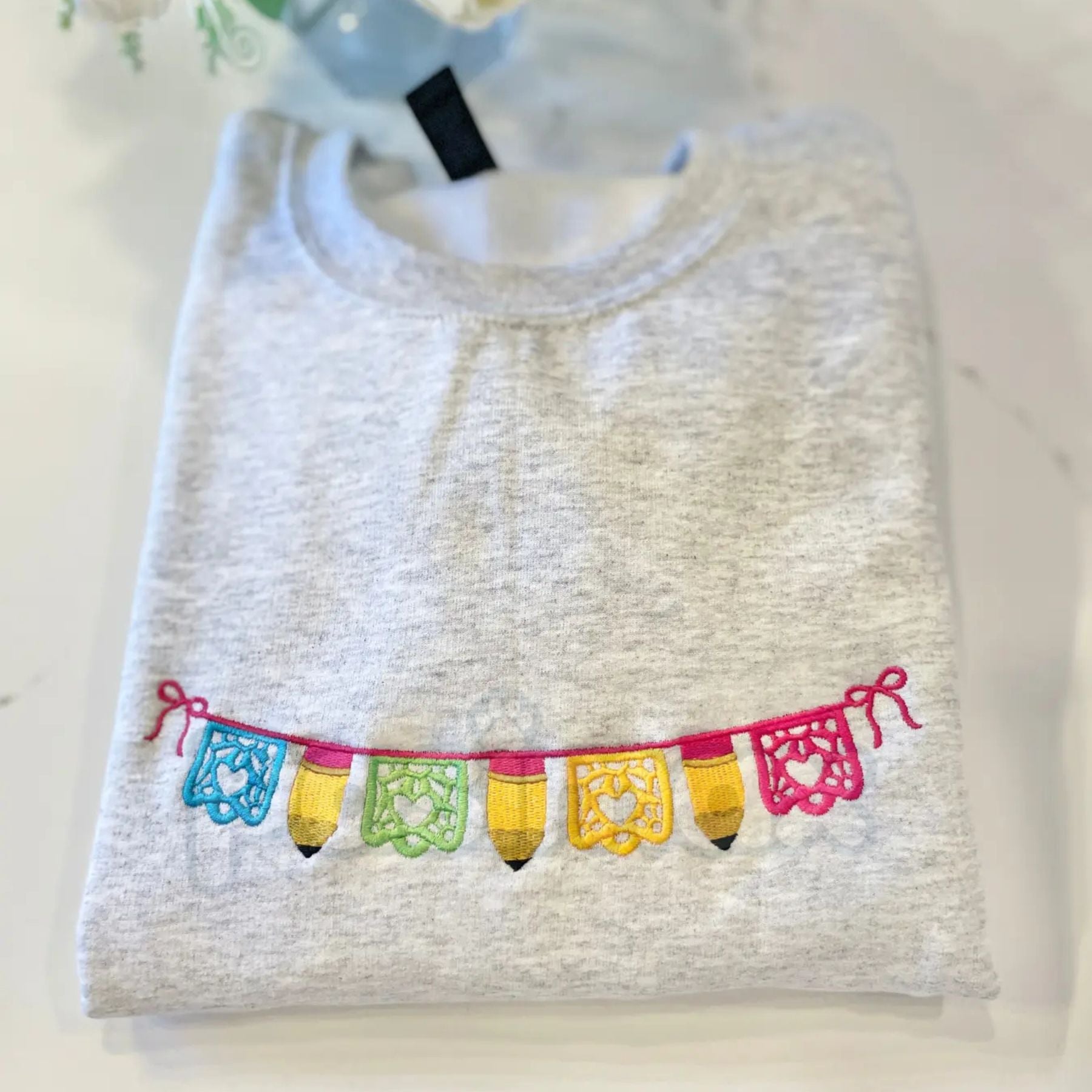 Pasimax Maestra Papel Picado Embroidered Sweatshirt – Hispanic Culture Teacher Crewneck — main product shot