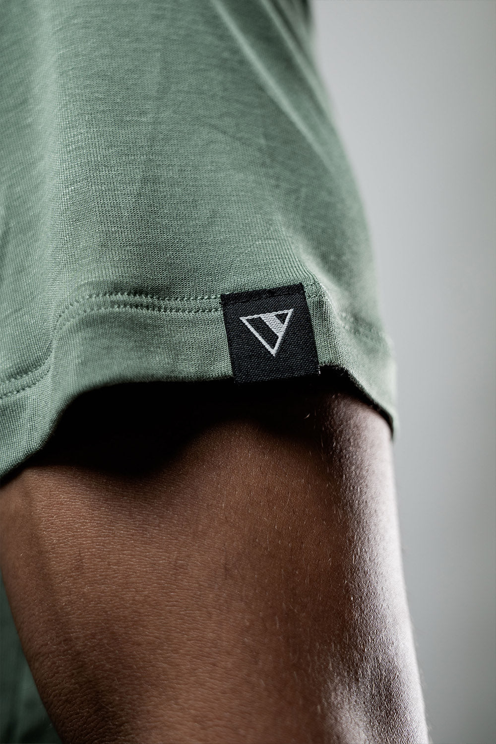 Varlo Men's Everyday Terra Tee (Ironwood) — Varlo branding close-up