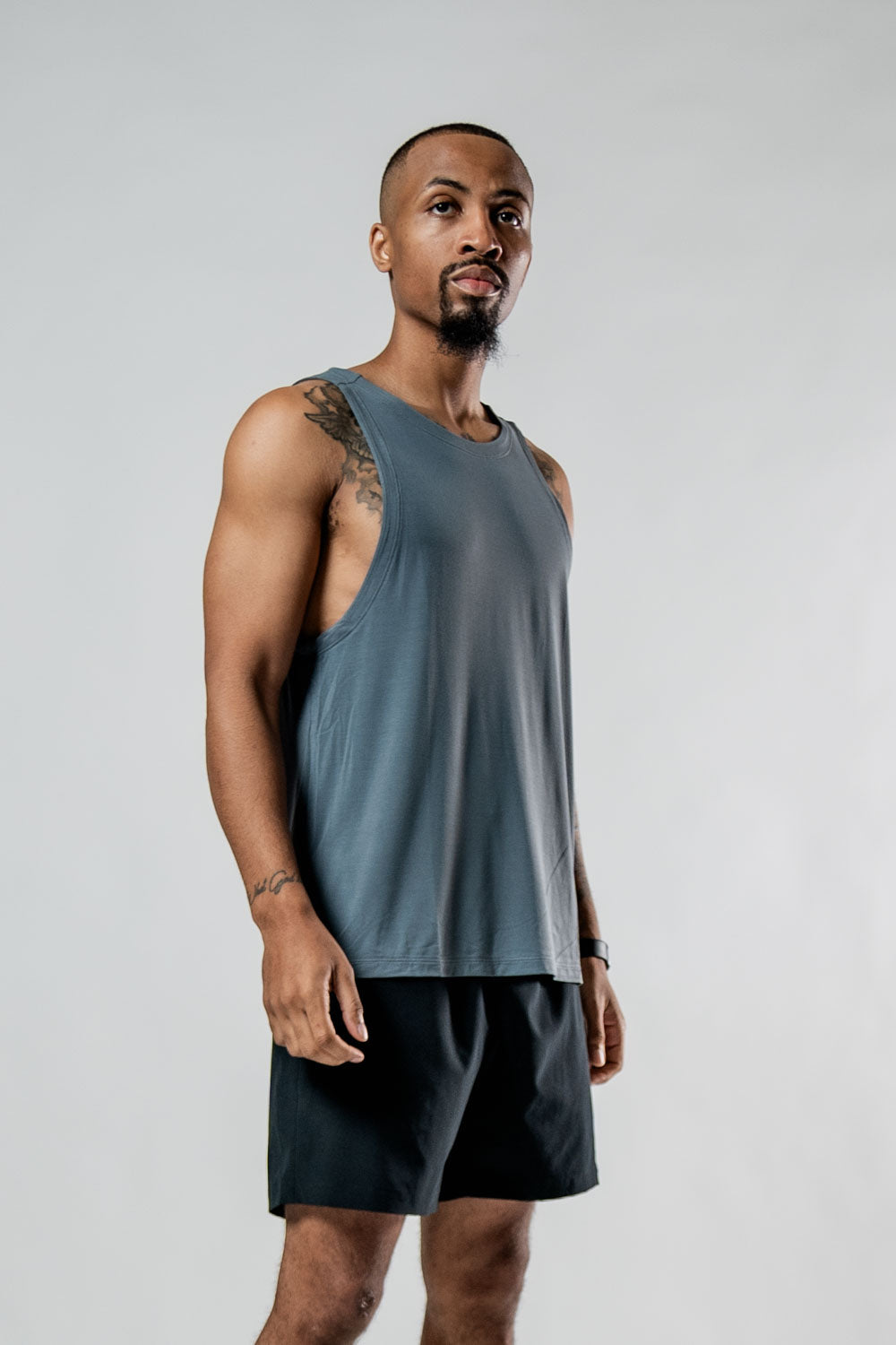 Varlo Men's Terra Recovery Tank (Ash Gray) — lifestyle worn / used context