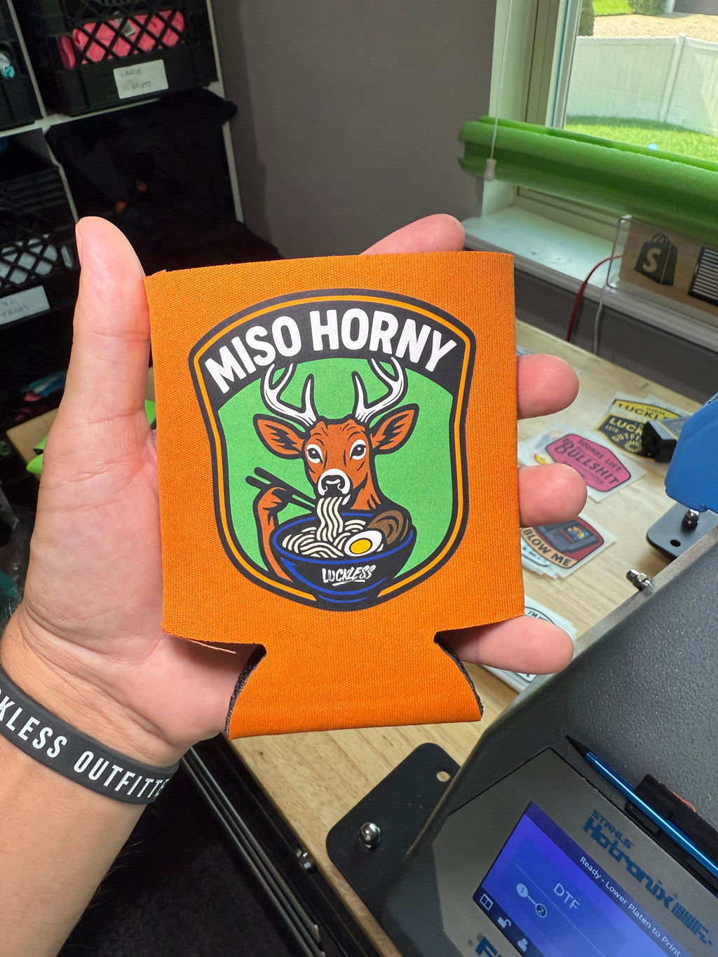 Luckless Outfitters Miso Horny Koozie — back view