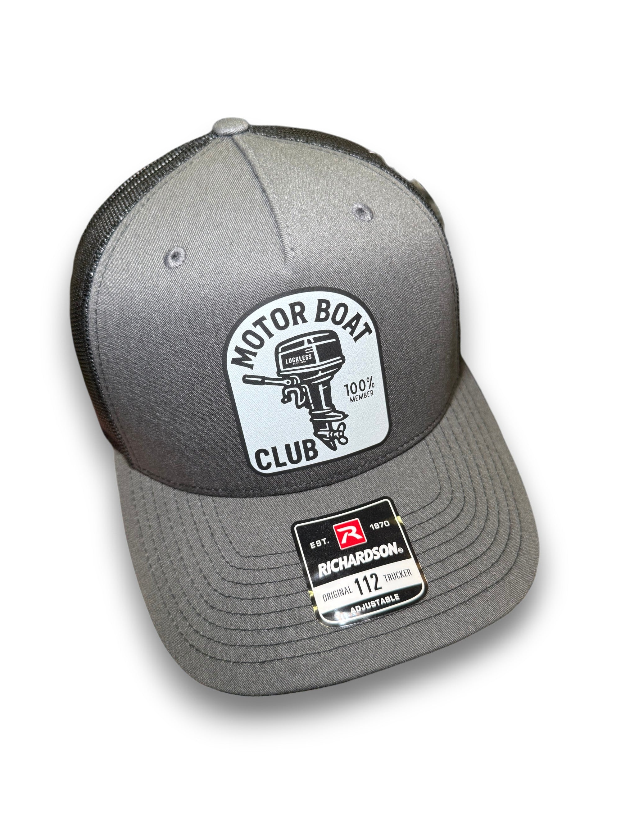 Luckless Outfitters Motor Boat Club Trucker Hat — main product shot