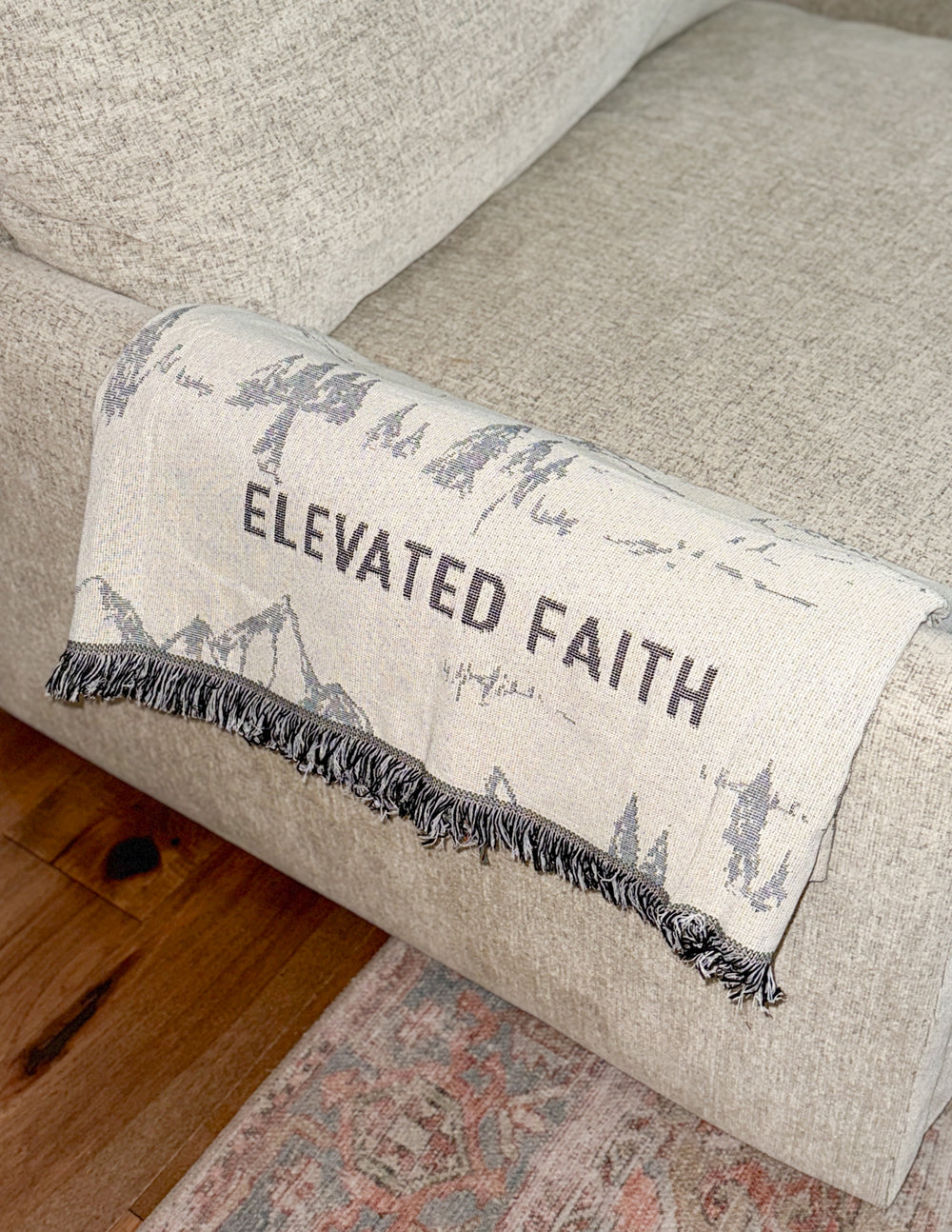 Elevated Faith Mountainscape Throw Blanket — lifestyle context