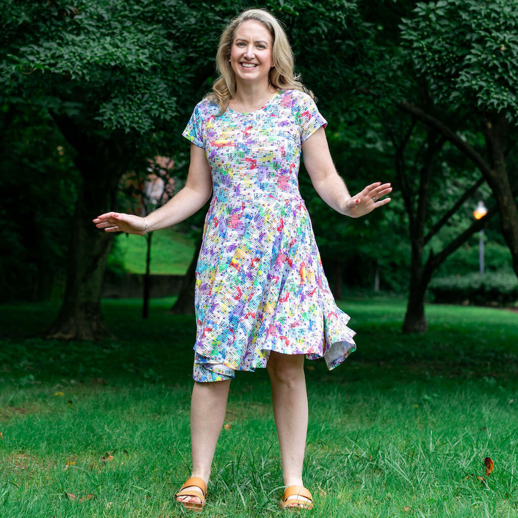 Princess Awesome & Boy Wonder Adult "Staff Meeting" Rainbow Music Notes Super Twirler Dress with Pockets — back view