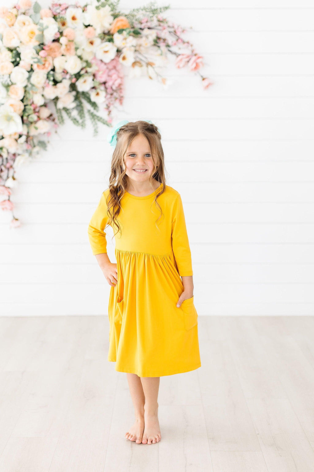 Mila & Rose ® Mustard 3/4 Sleeve Pocket Twirl Dress — lifestyle context