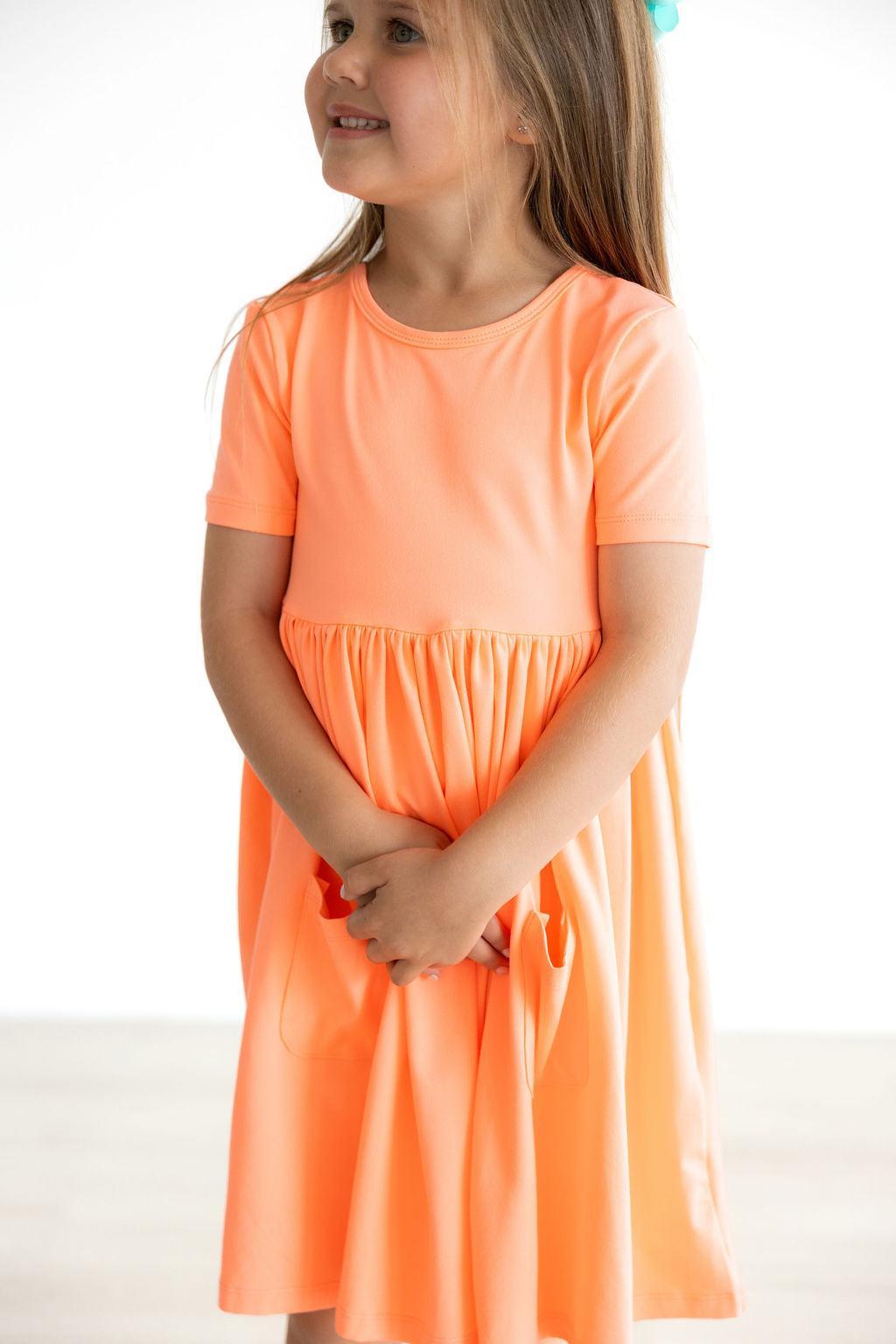 Mila & Rose ® Neon Coral S/S Pocket Twirl Dress — detail close-up