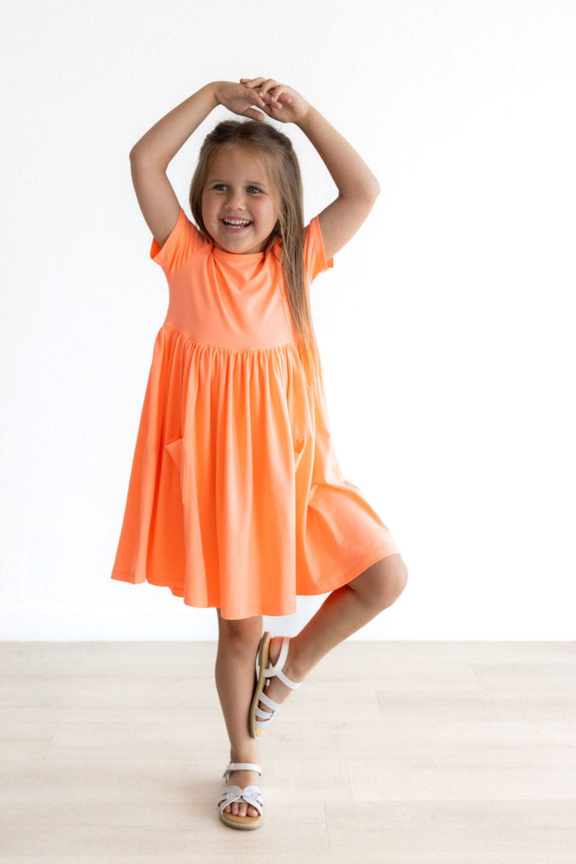 Mila & Rose ® Neon Coral S/S Pocket Twirl Dress — lifestyle context