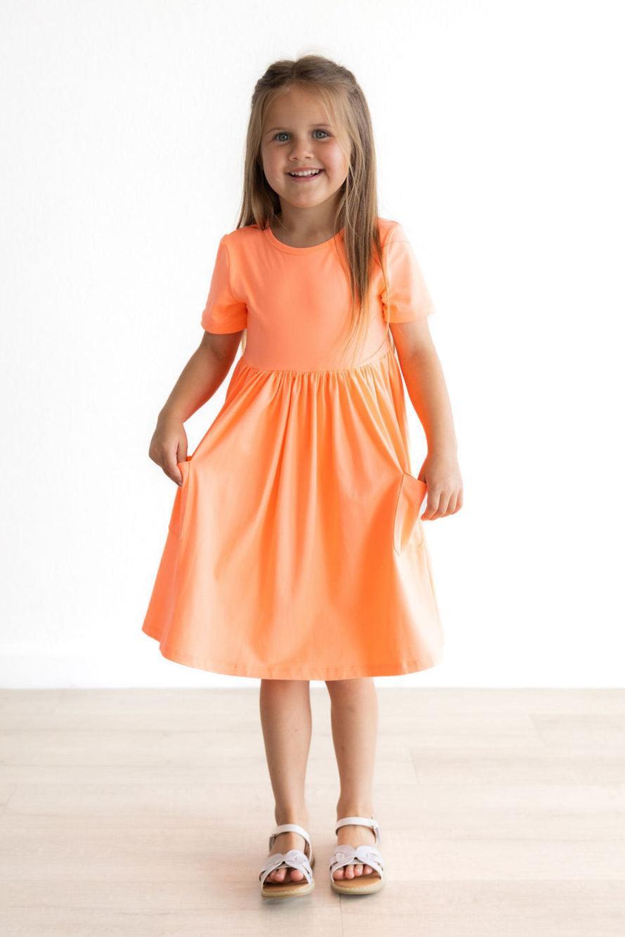 Mila & Rose ® Neon Coral S/S Pocket Twirl Dress — side view