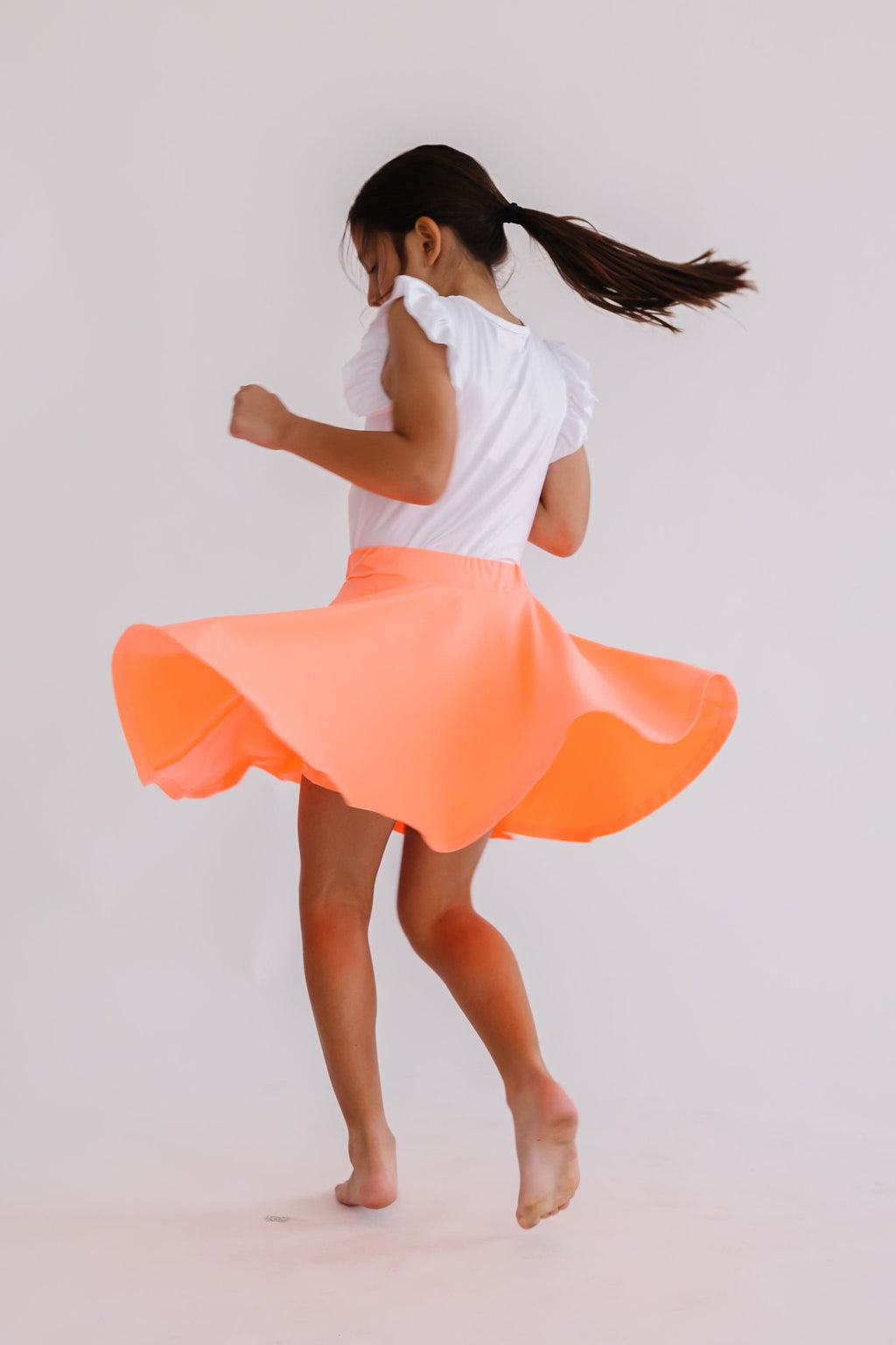 Mila & Rose ® Neon Coral Twirl Skort — detail close-up