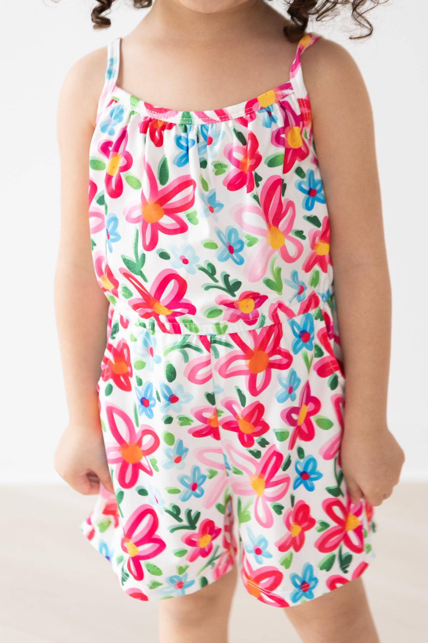 Mila & Rose ® Neon Floral Strappy Play Romper — detail close-up