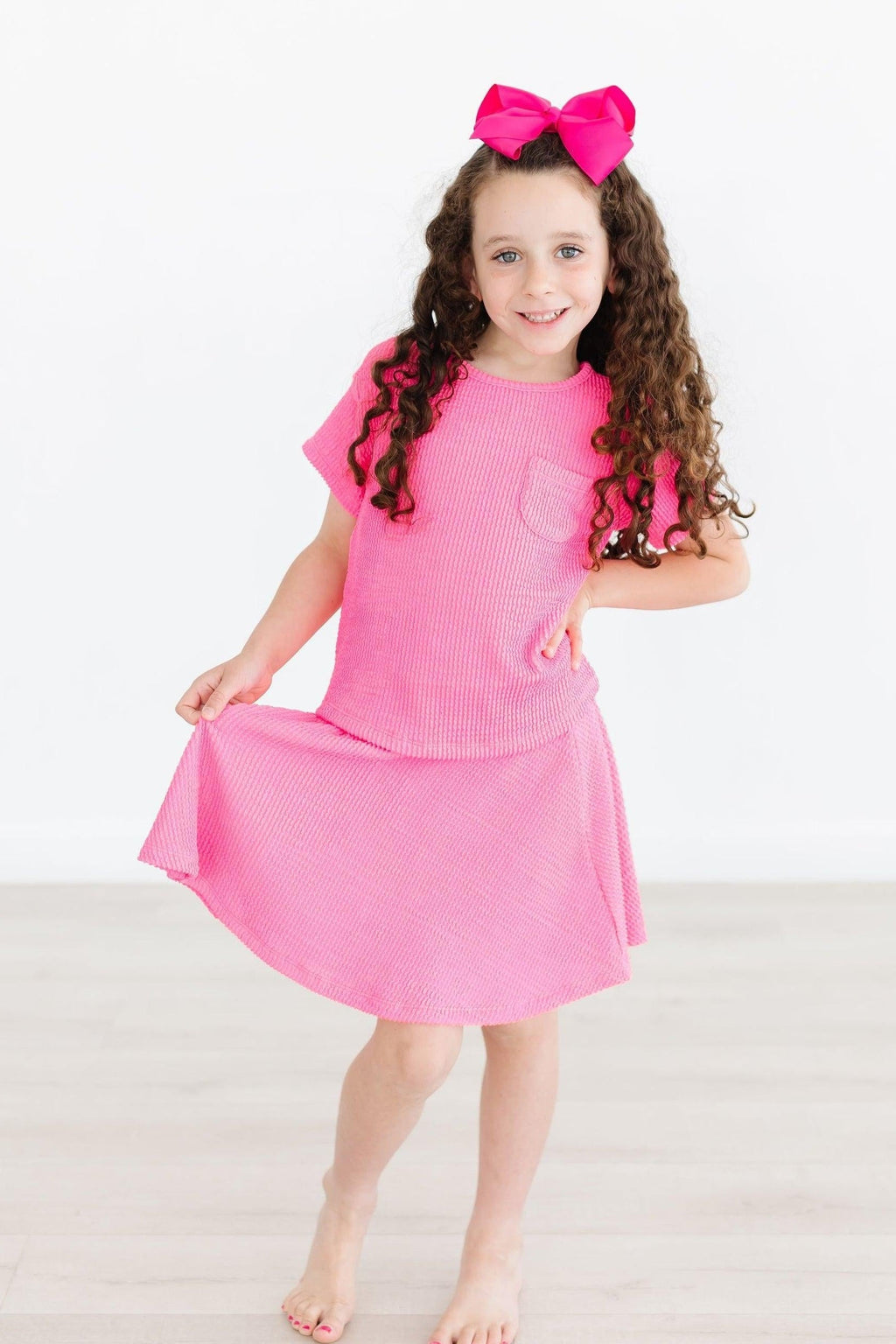 Mila & Rose ® Neon Pink Scrunchy Twirl Skort — detail close-up
