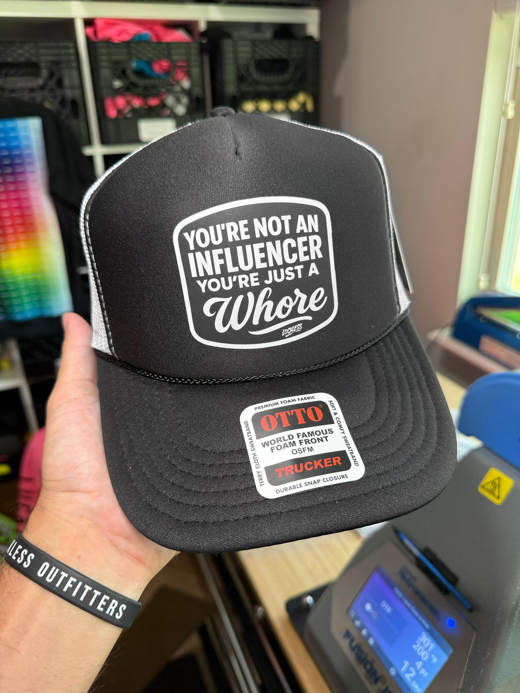 Luckless Outfitters Not an Influencer Trucker Hat — back view