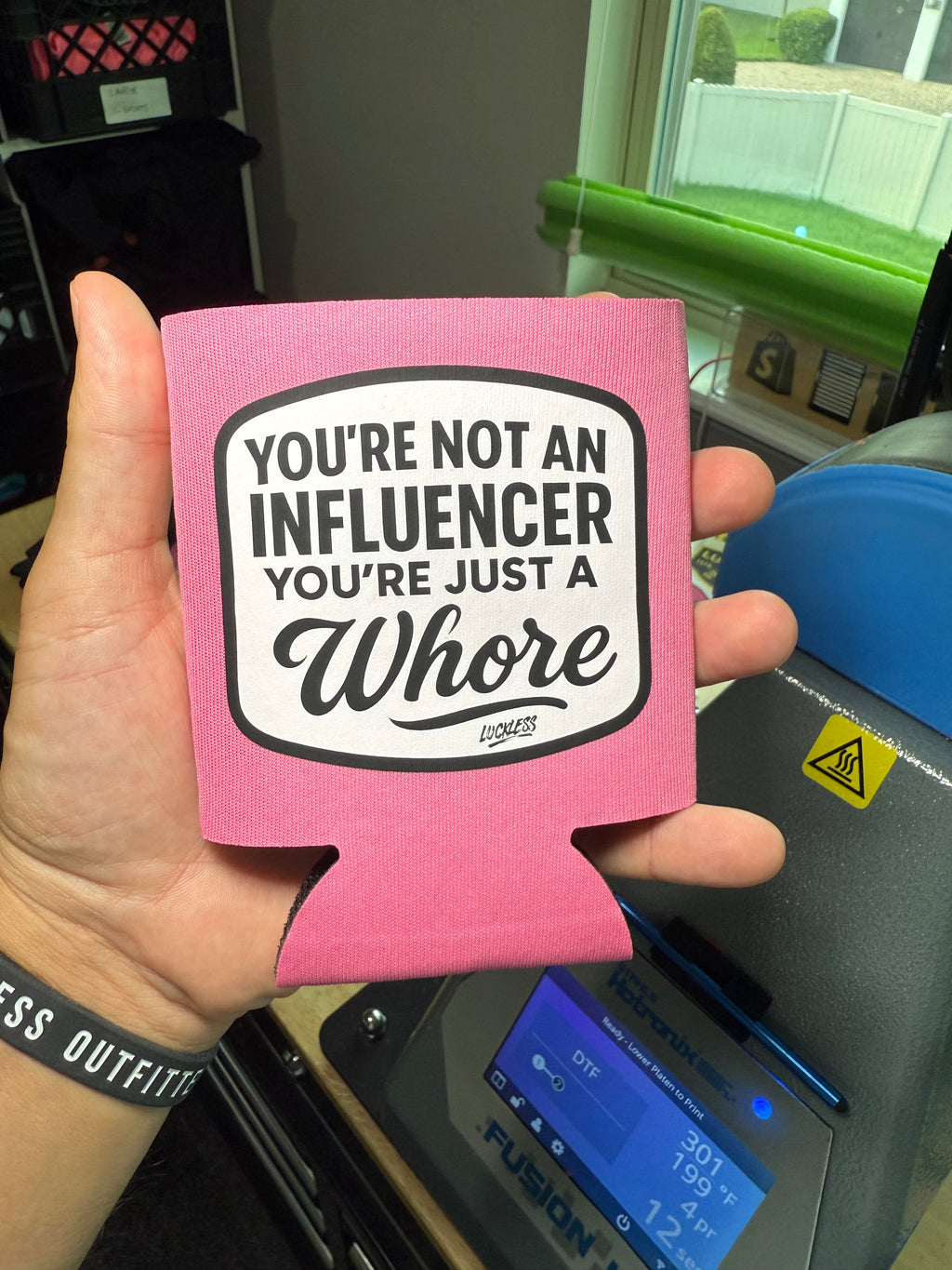 Luckless Outfitters Not An Influencer Koozie — side view