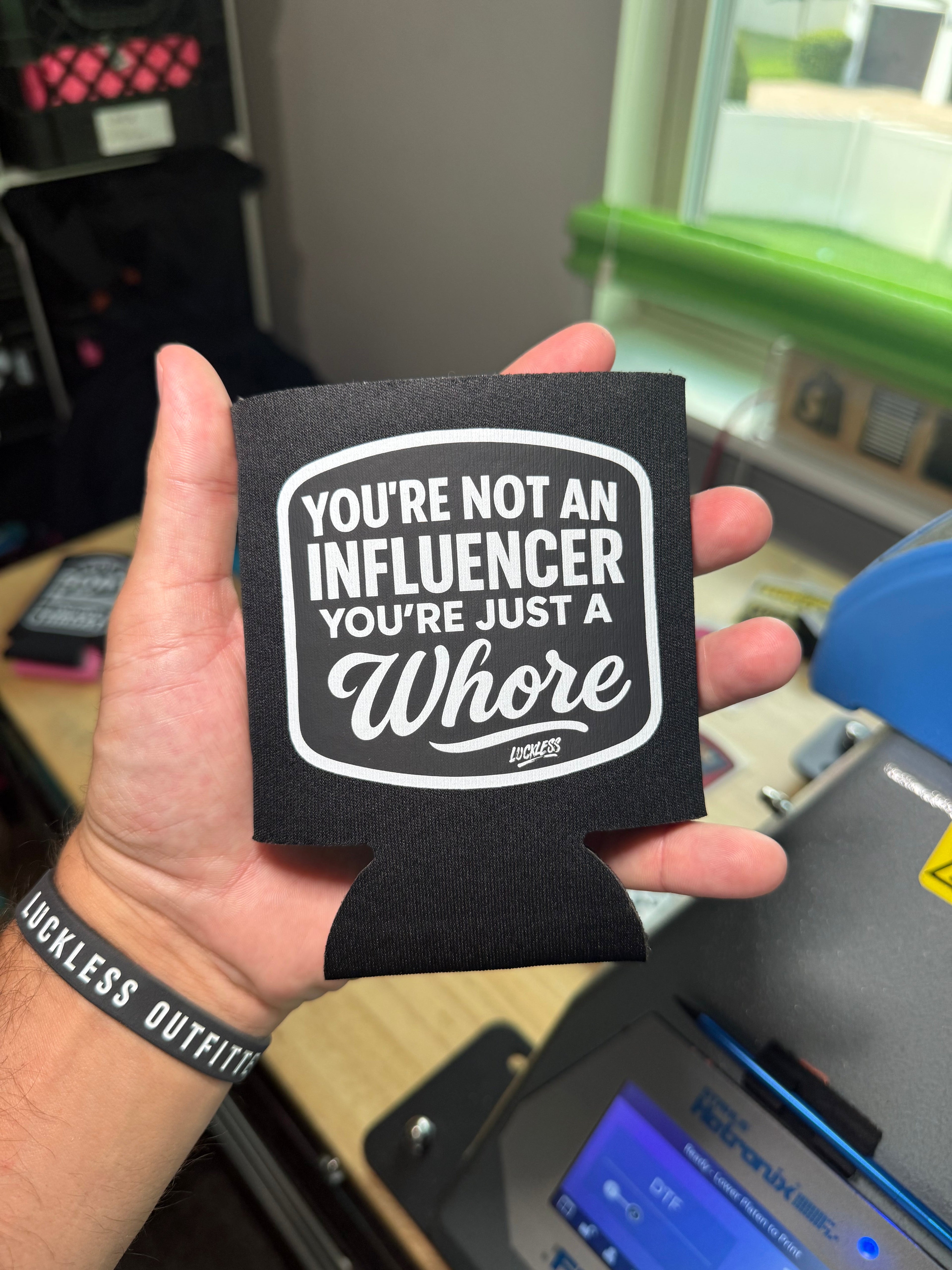 Luckless Outfitters Not An Influencer Koozie — lifestyle context